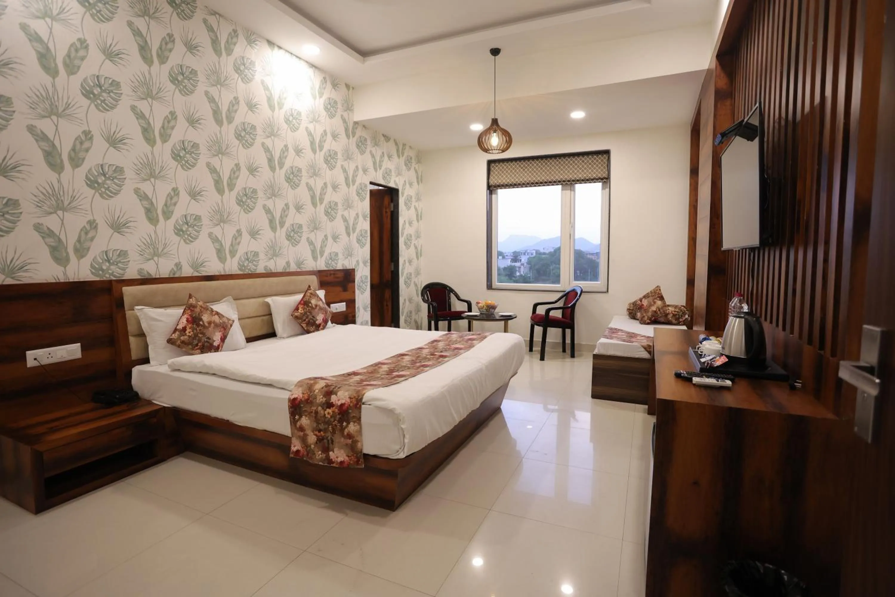 Bedroom, Bed in Hotel Bhairav Bagh with Swimming Pool