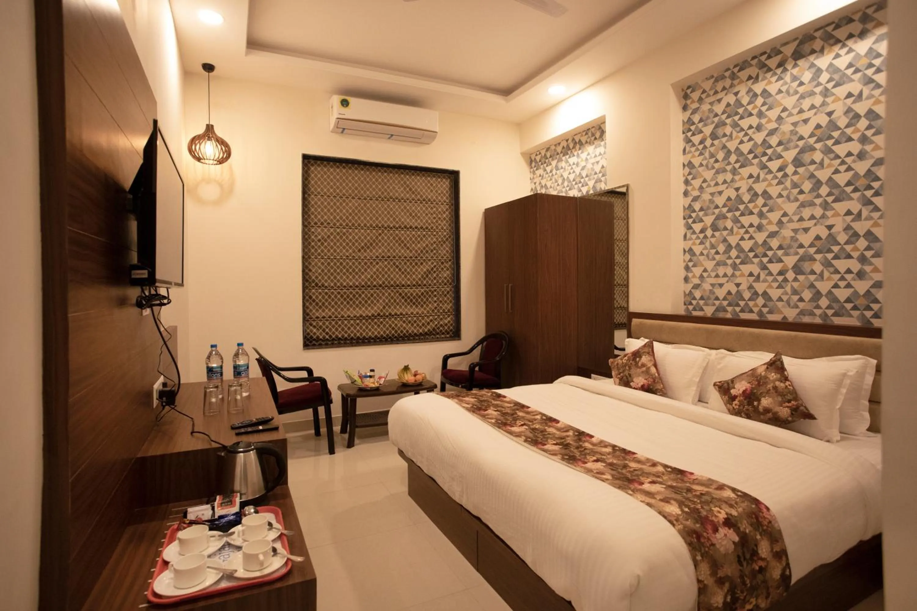 Bed in Hotel Bhairav Bagh with Swimming Pool