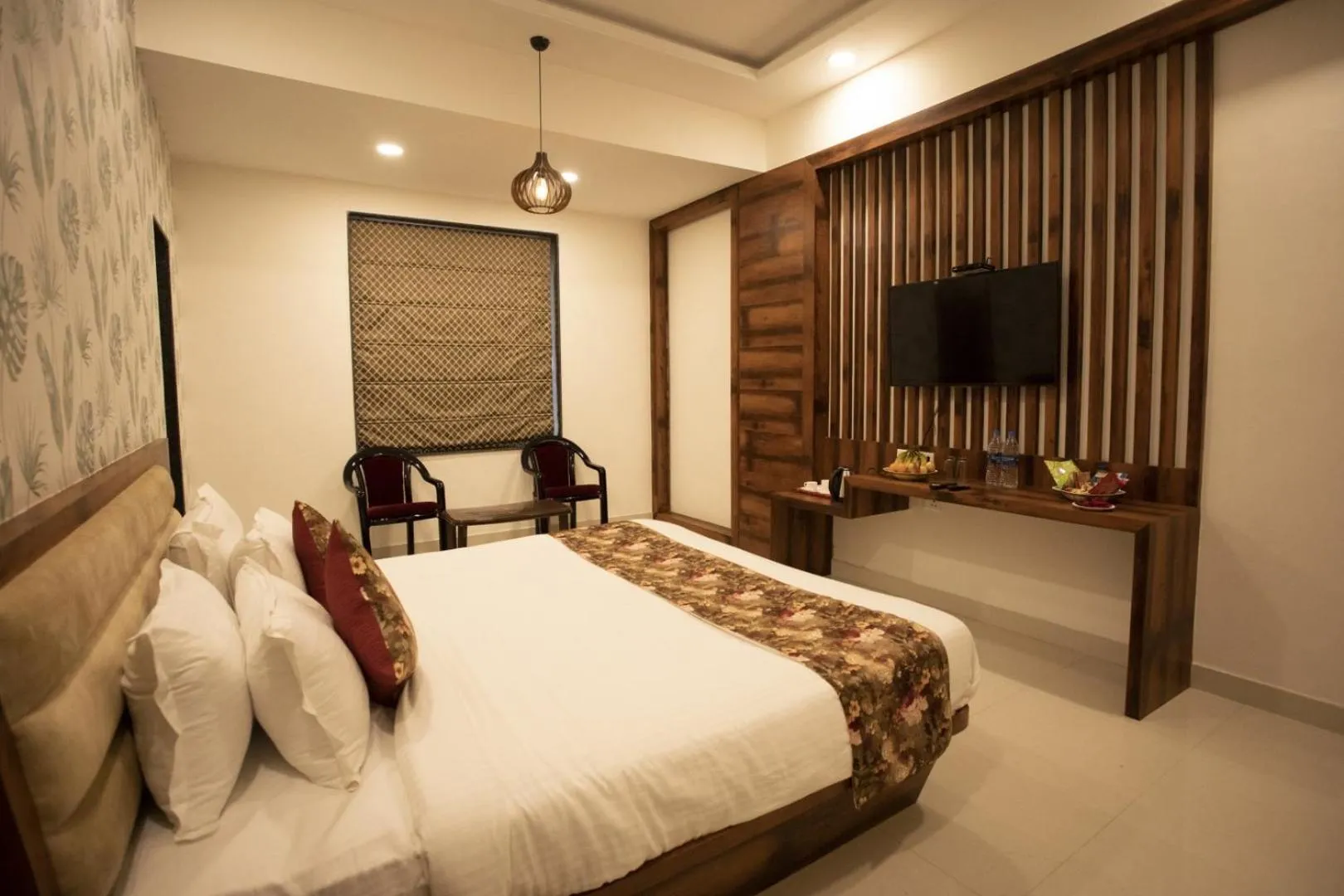 Photo of the whole room, Bed in Hotel Bhairav Bagh with Swimming Pool