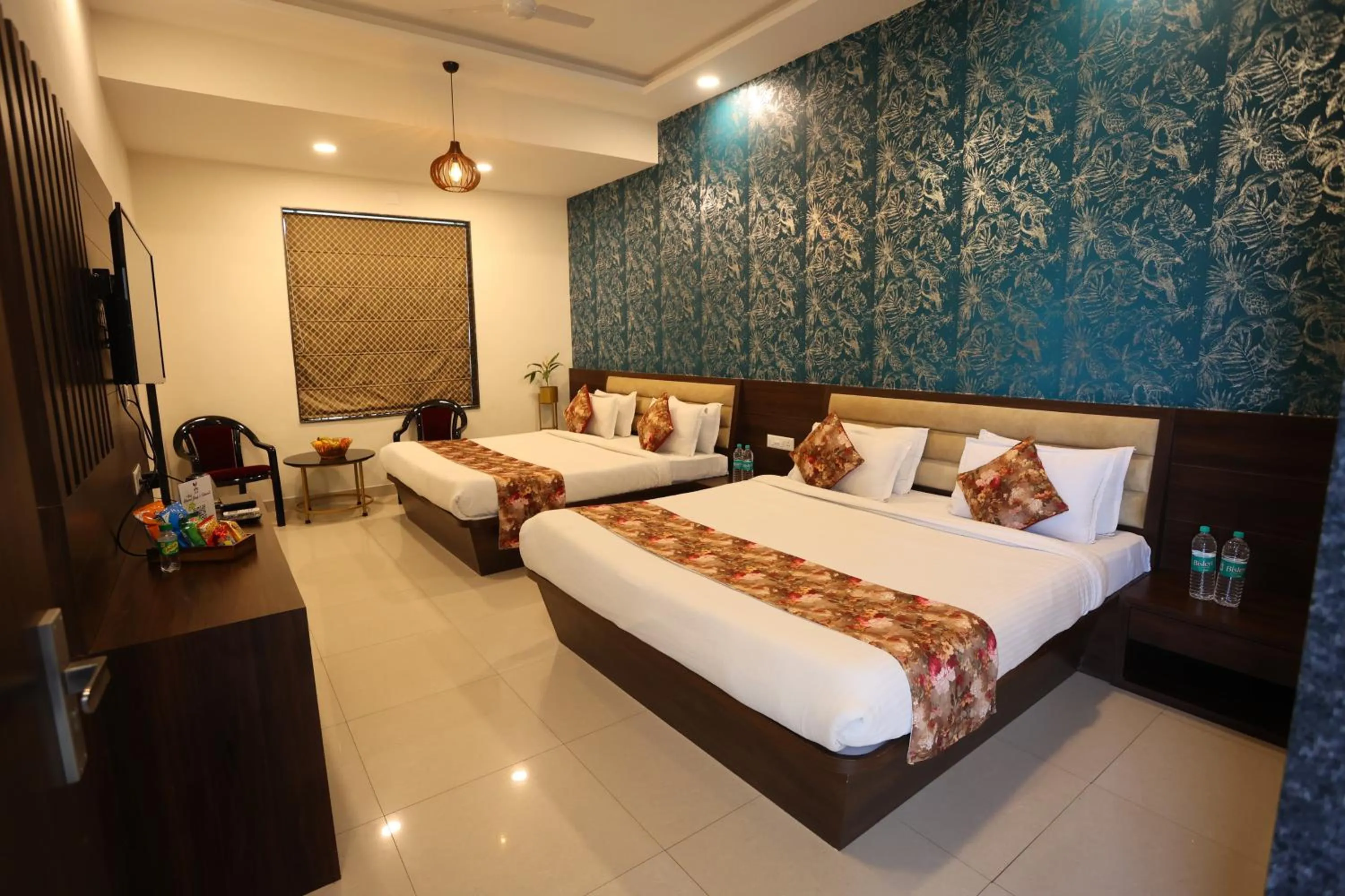 Bed in Hotel Bhairav Bagh with Swimming Pool