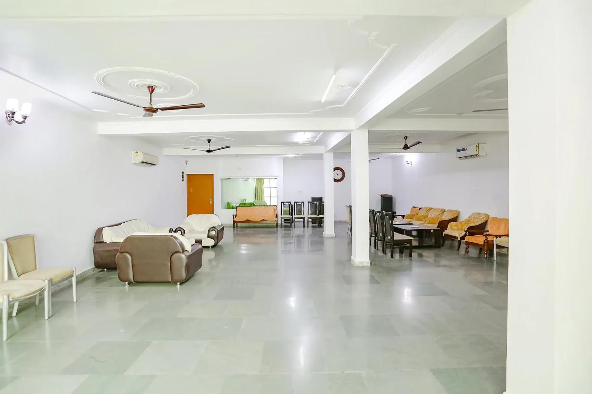 Seating area in FabHotel Premium Rooms - Nr Yashobhoomi Convention Centre