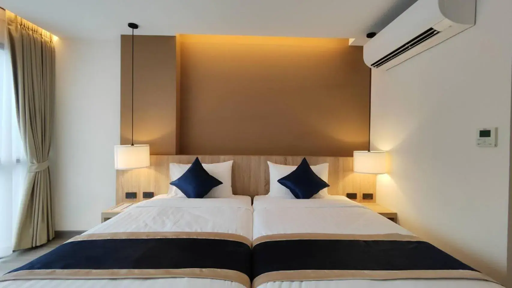 Bed in Hi Chiangmai Hotel Bed in Hi Chiangmai Hotel