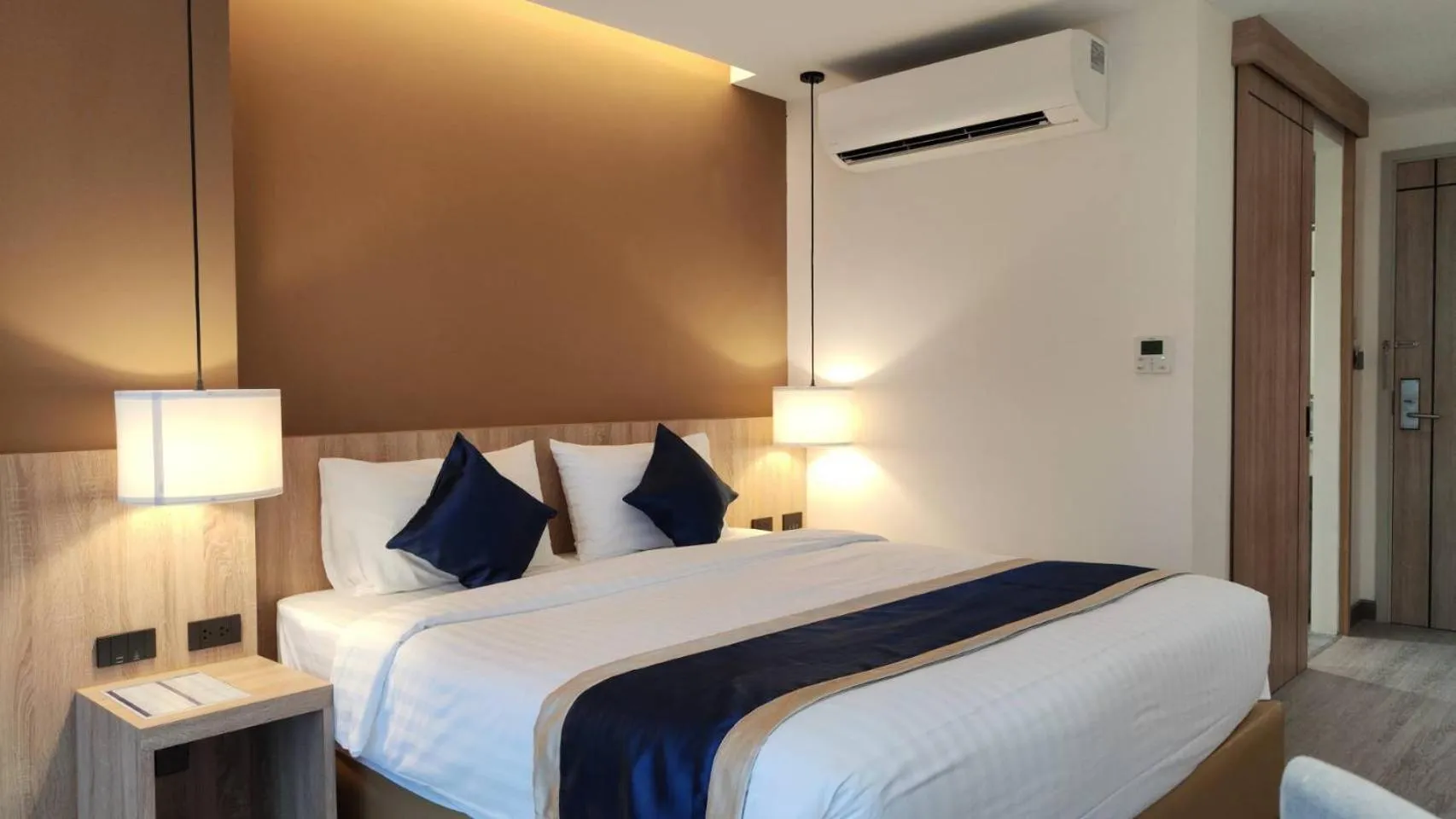 Bed in Hi Chiangmai Hotel