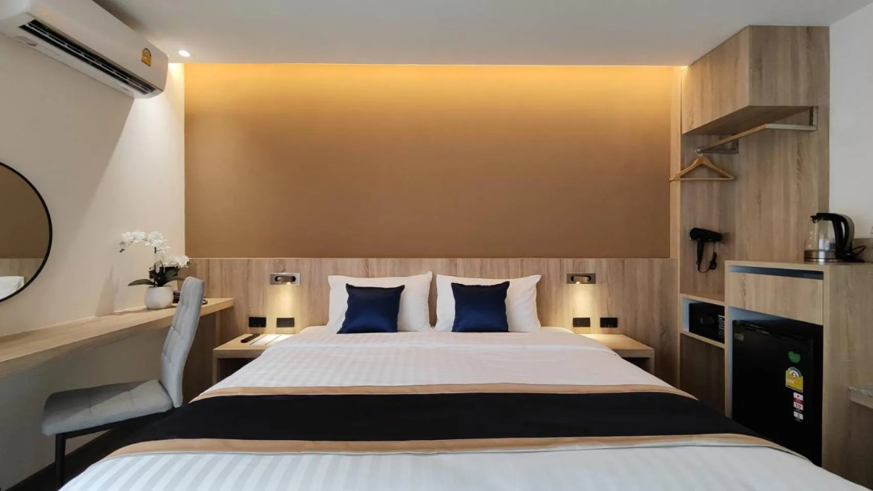 Bed in Hi Chiangmai Hotel