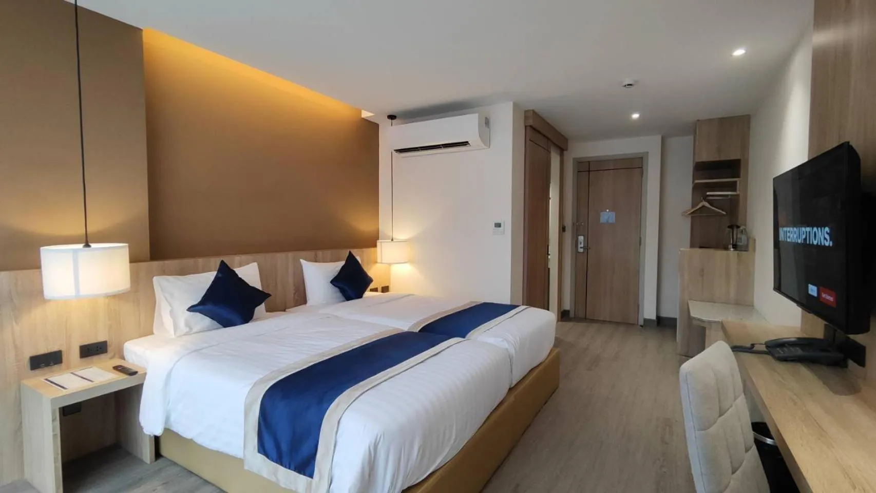 Bed in Hi Chiangmai Hotel