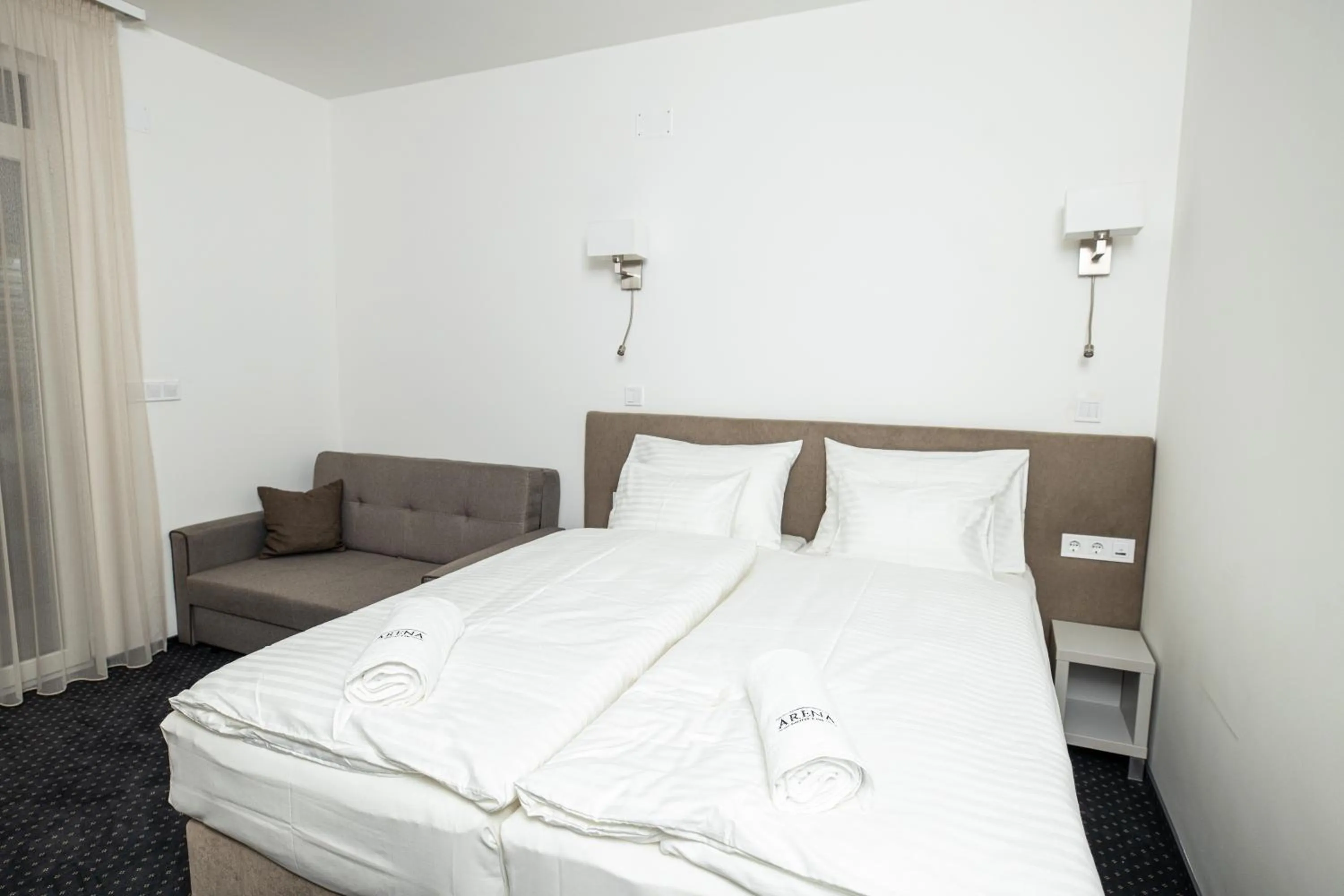 Bed in Arena Deluxe & Spa