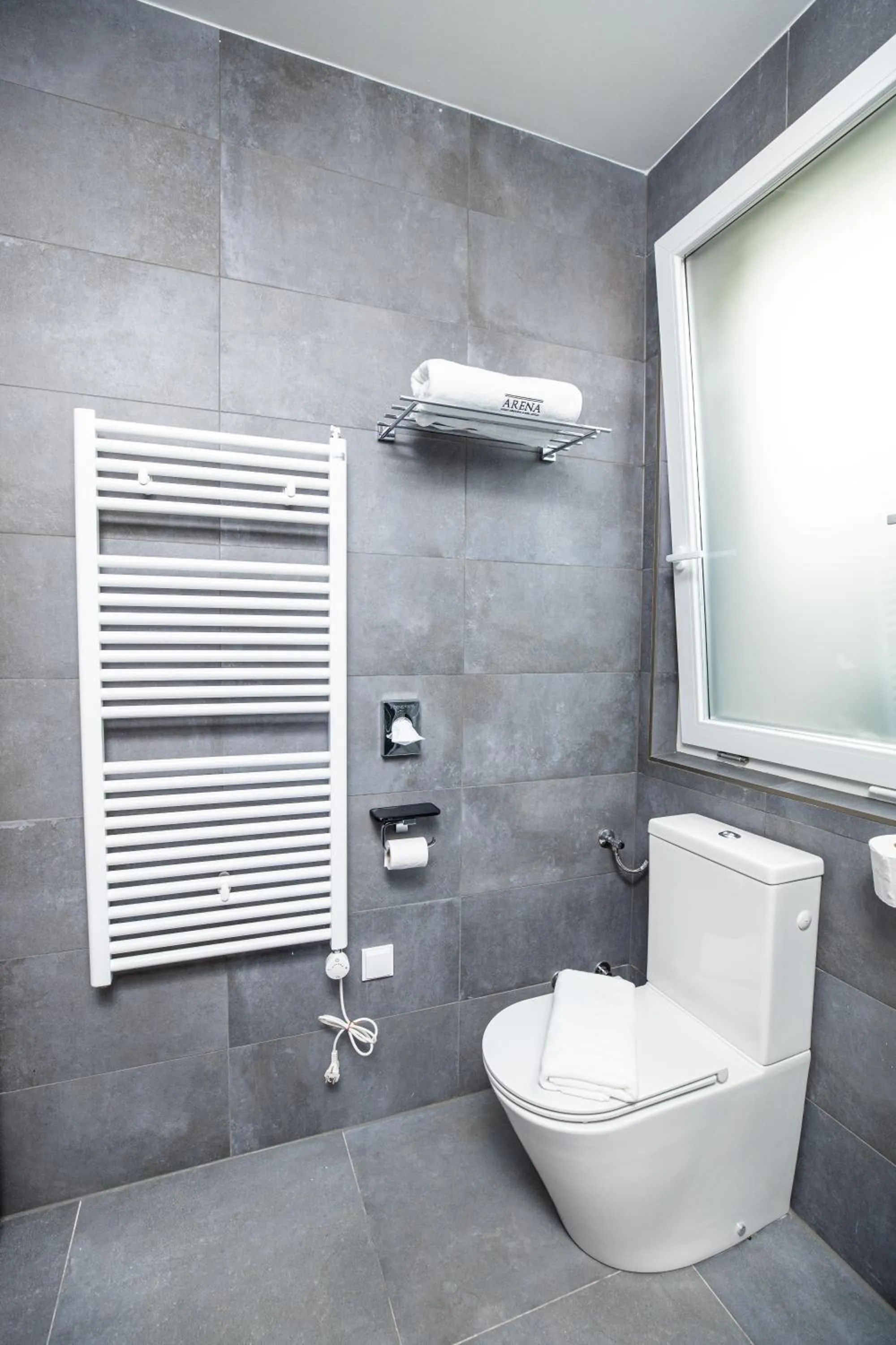 Bathroom in Arena Deluxe & Spa