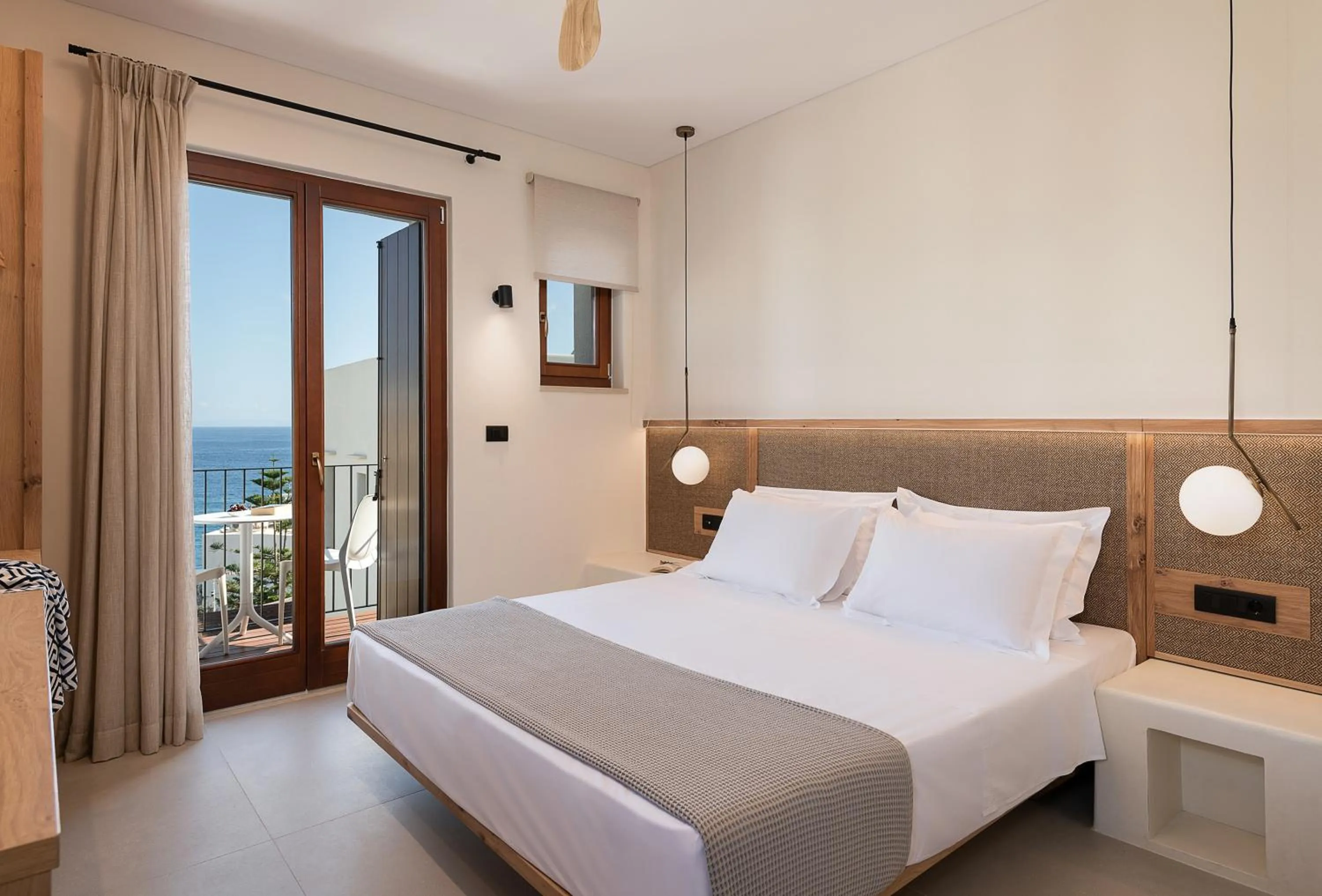 Bed in The Authentic Village Boutique Hotel