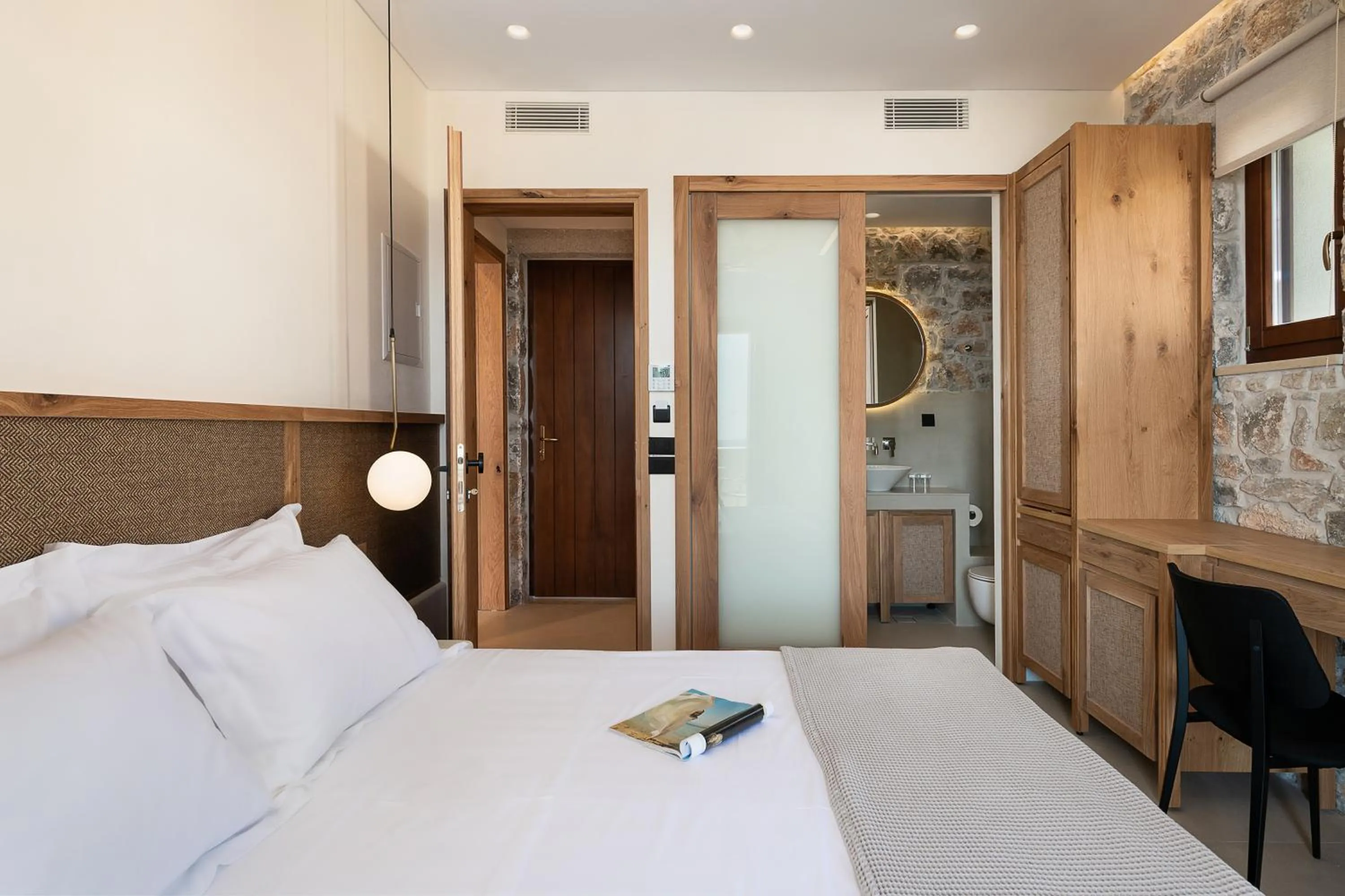 Bed in The Authentic Village Boutique Hotel