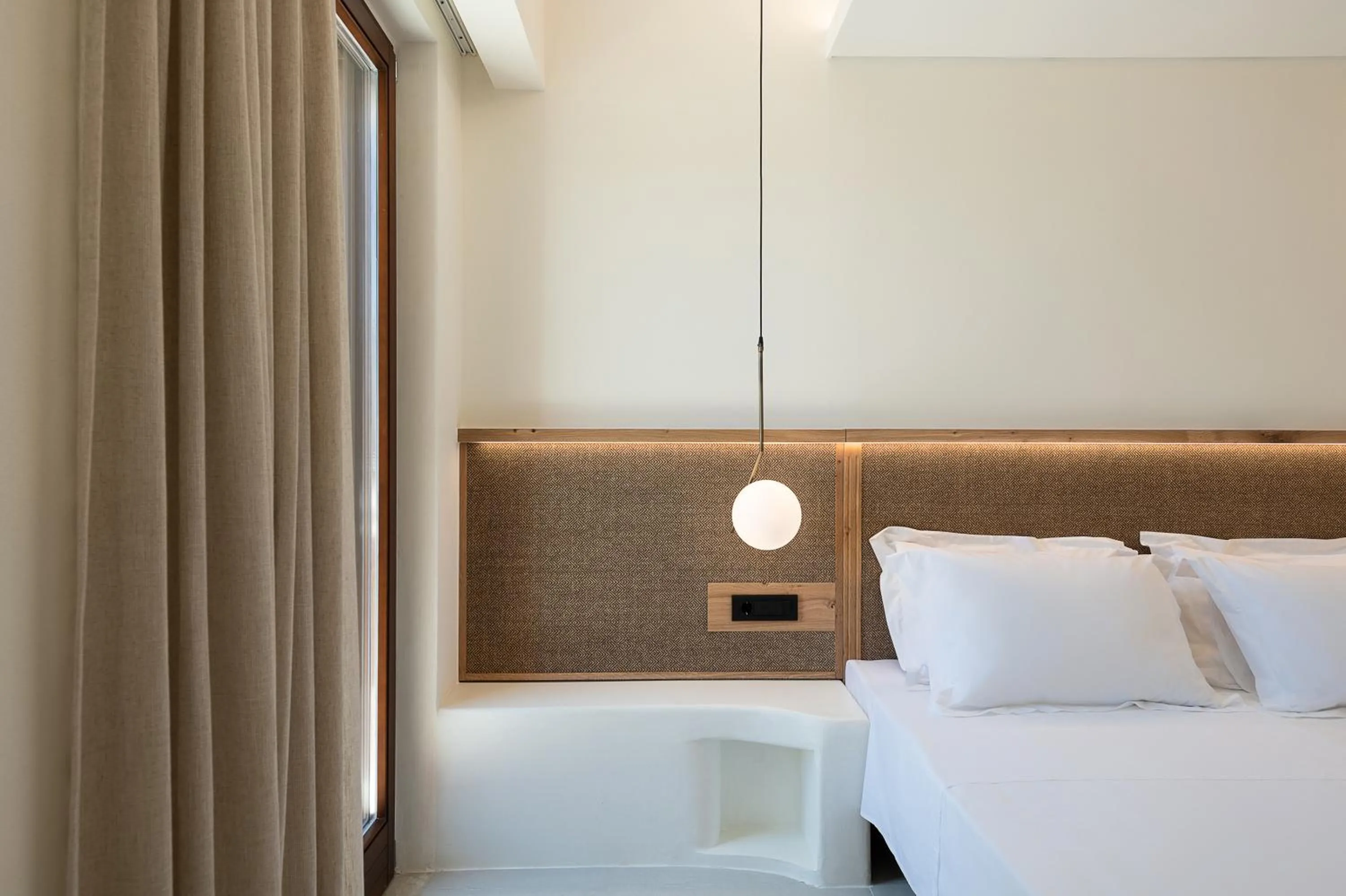 Bed in The Authentic Village Boutique Hotel