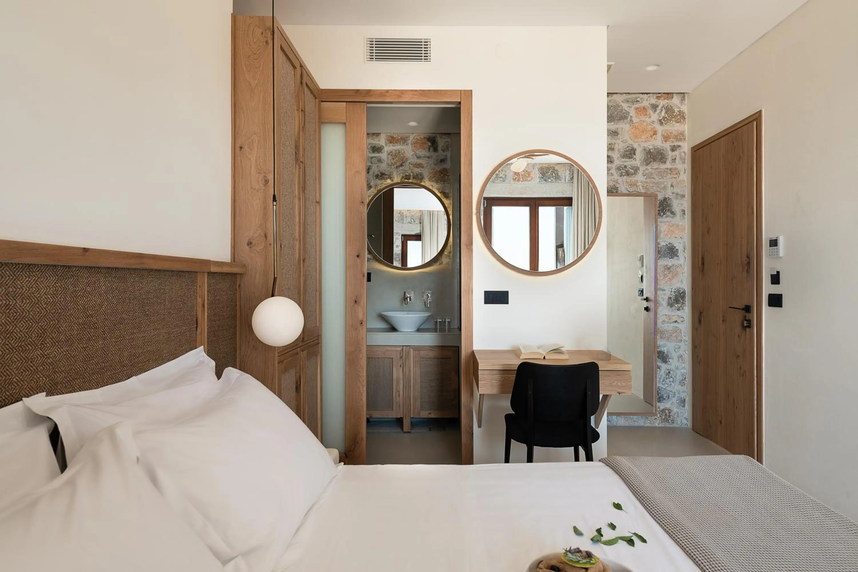 Bed in The Authentic Village Boutique Hotel