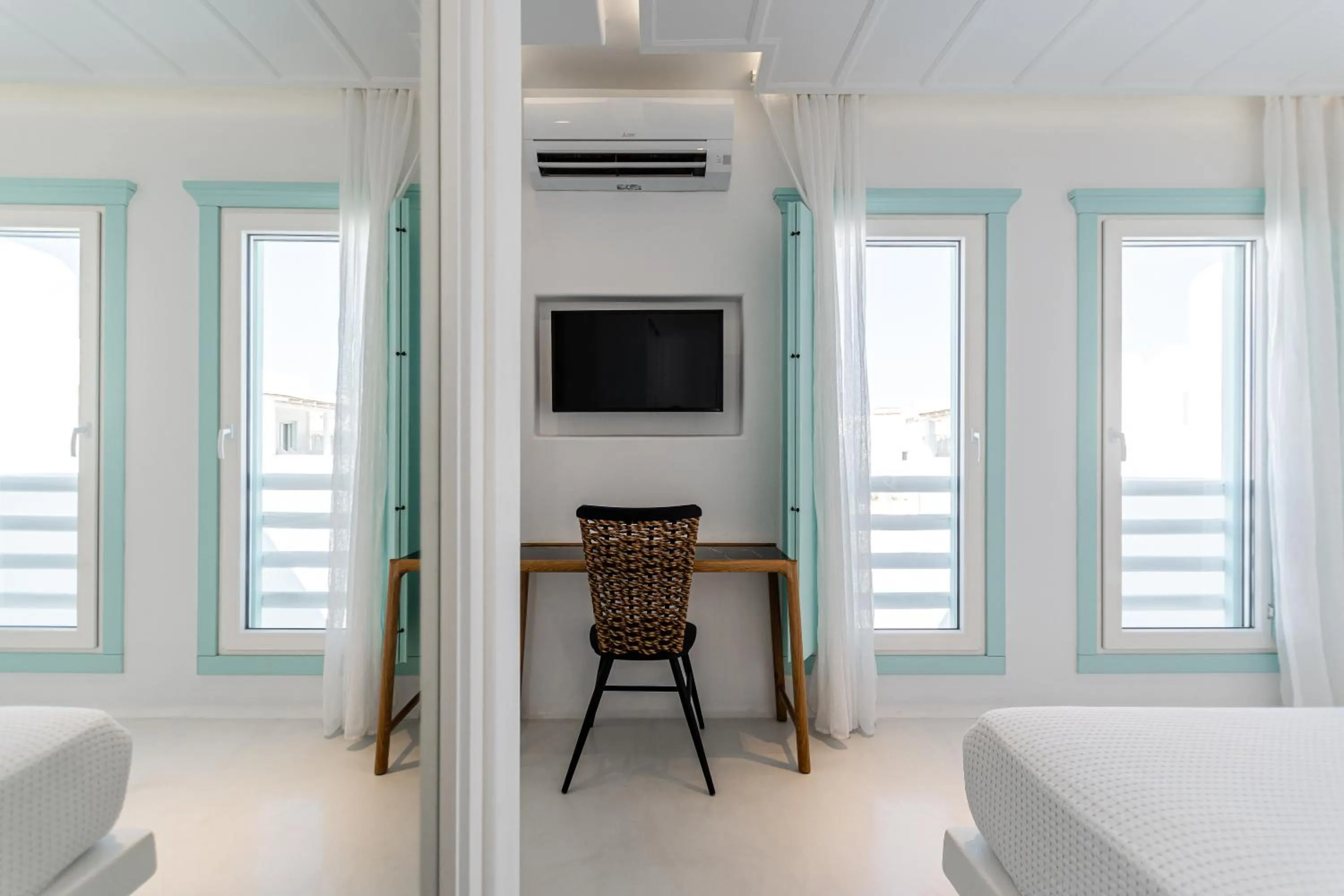 Patio, Bed in Majo Suites Hotel