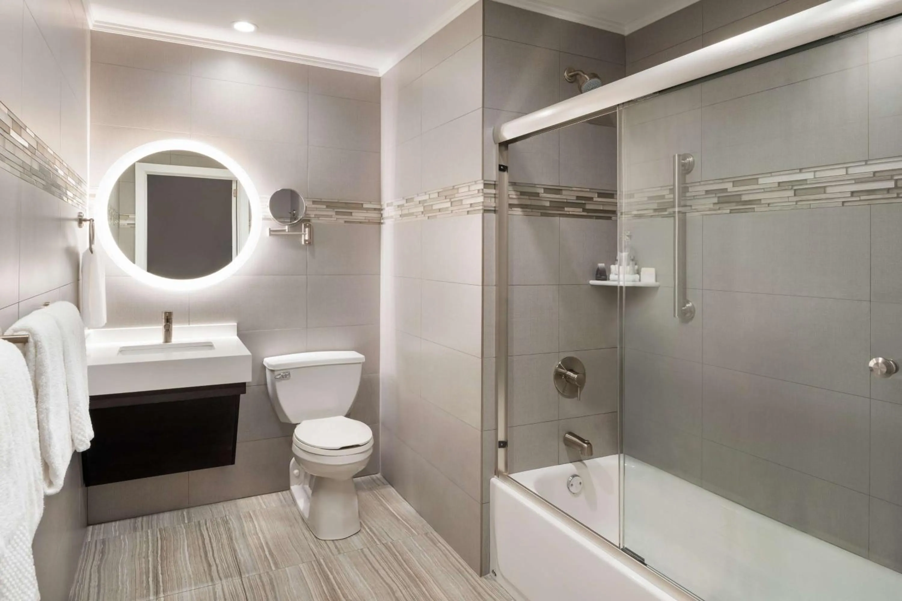 Bathroom in Martinique New York on Broadway, Curio Collection by Hilton