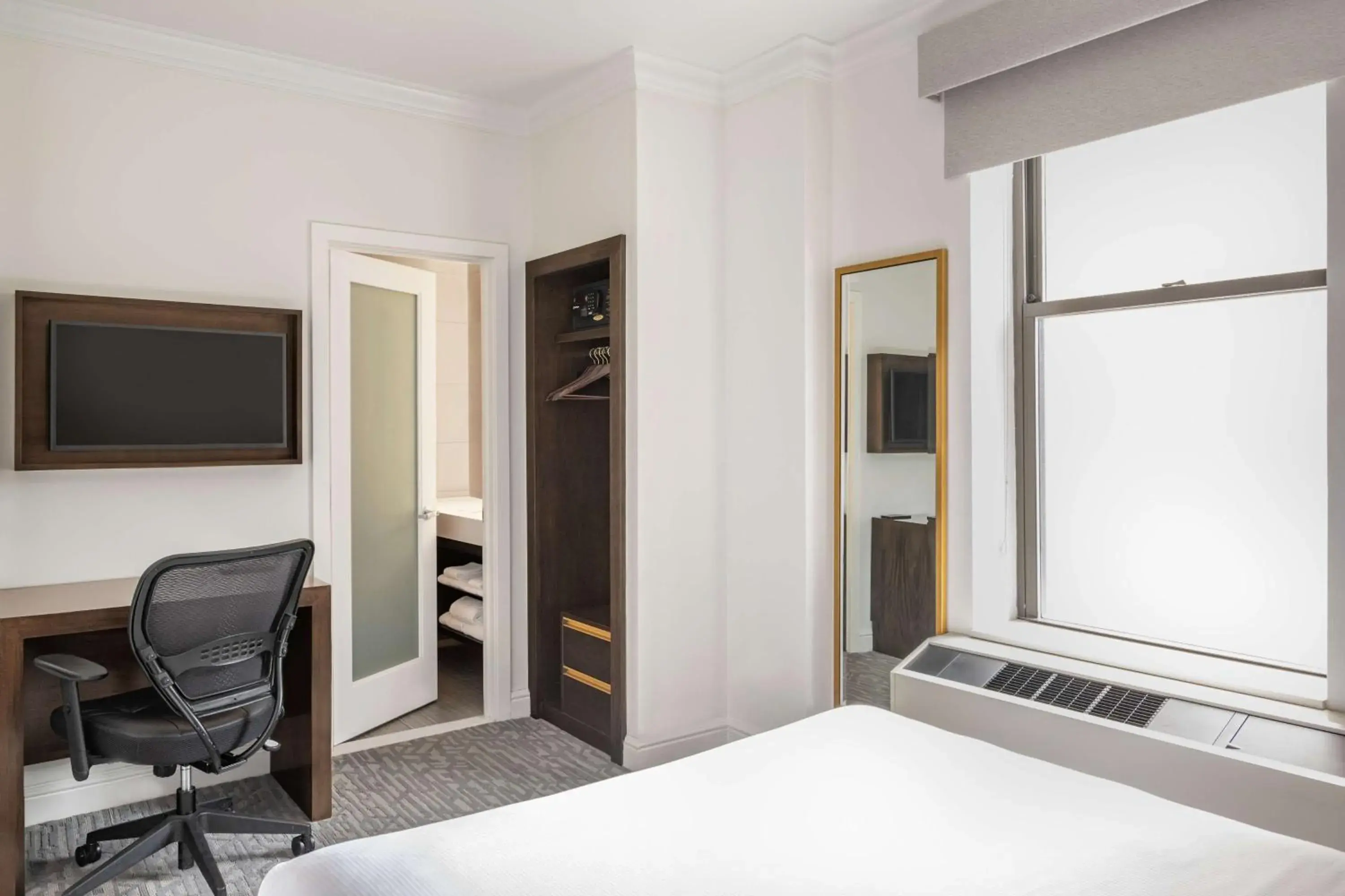 Bedroom, Bed in Martinique New York on Broadway, Curio Collection by Hilton Bedroom, Bed in Martinique New York on Broadway, Curio Collection by Hilton