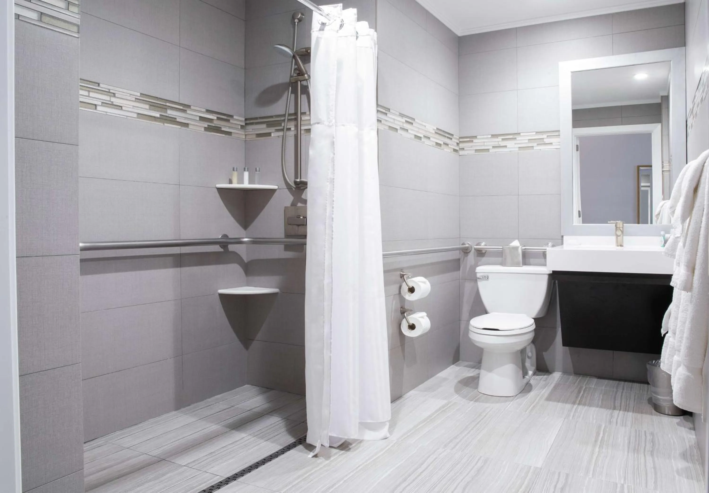 Bathroom in Martinique New York on Broadway, Curio Collection by Hilton