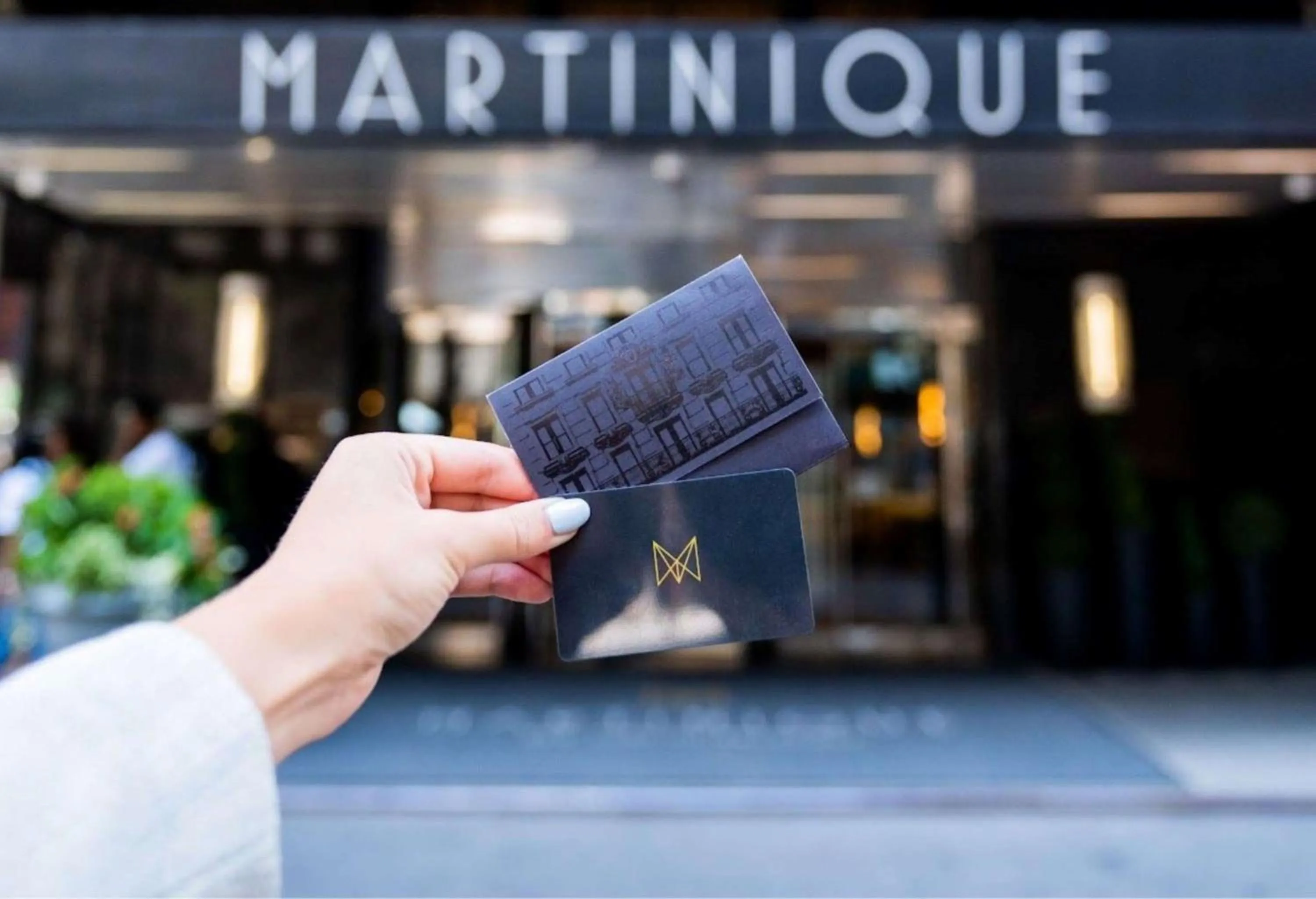 Property logo or sign in Martinique New York on Broadway, Curio Collection by Hilton