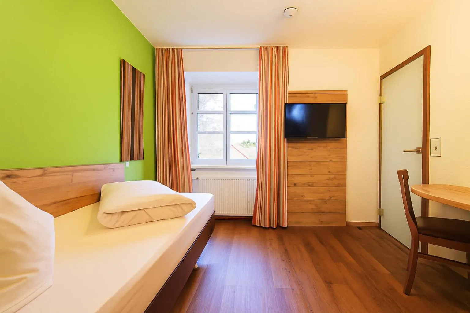 Photo of the whole room, Bed in Landgasthof Hotel Rebstock