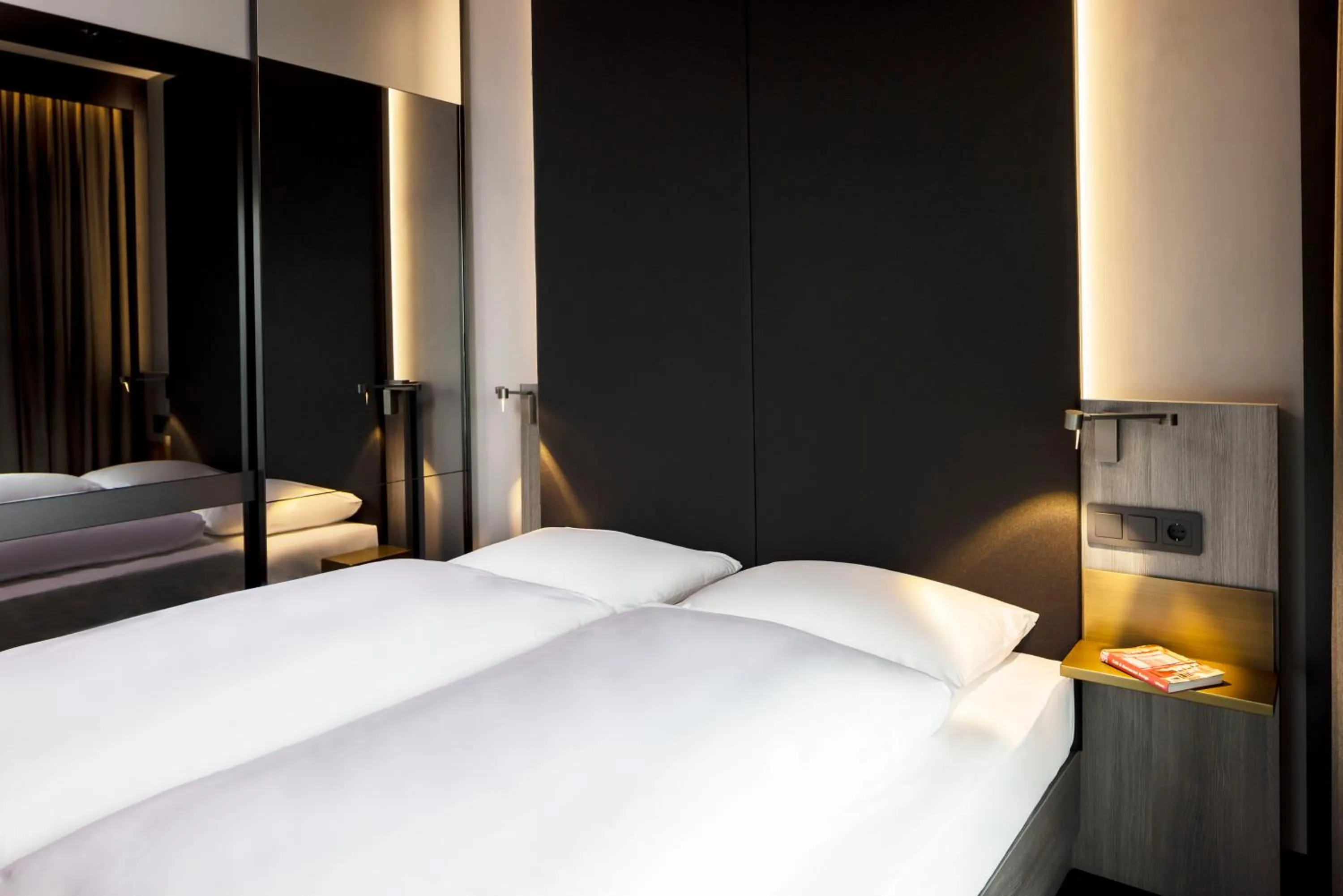 Bed in Hotel AMANO East Side