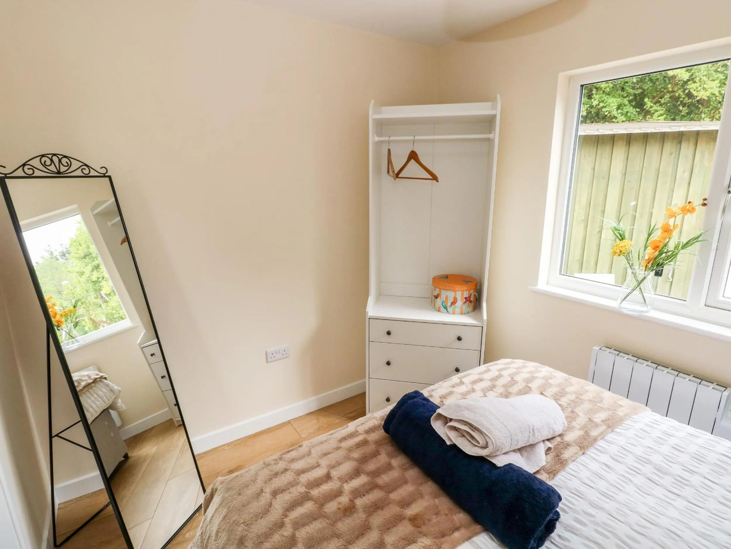 Bed in Ramsey Lodge Bier Wood Lodges