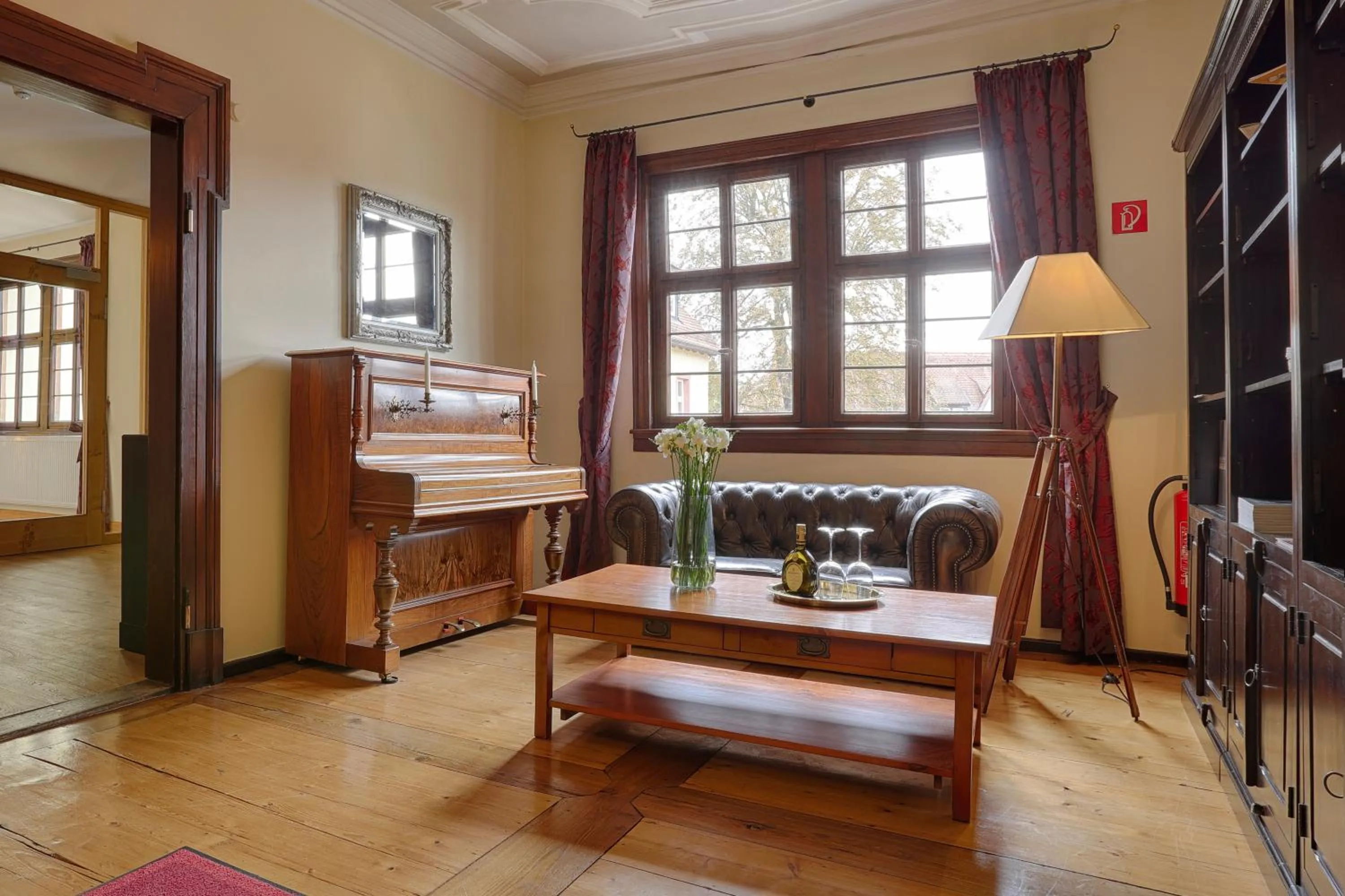 Seating area, Bed in homie hotel Wiener Botschaft