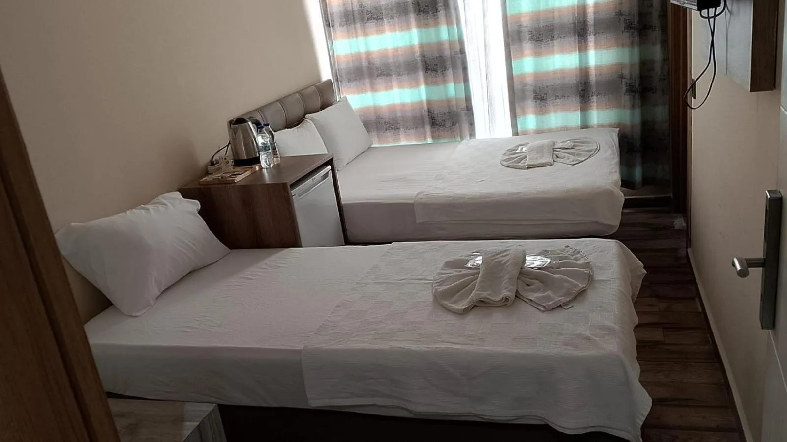 Bed in KALİSPERA HOTEL