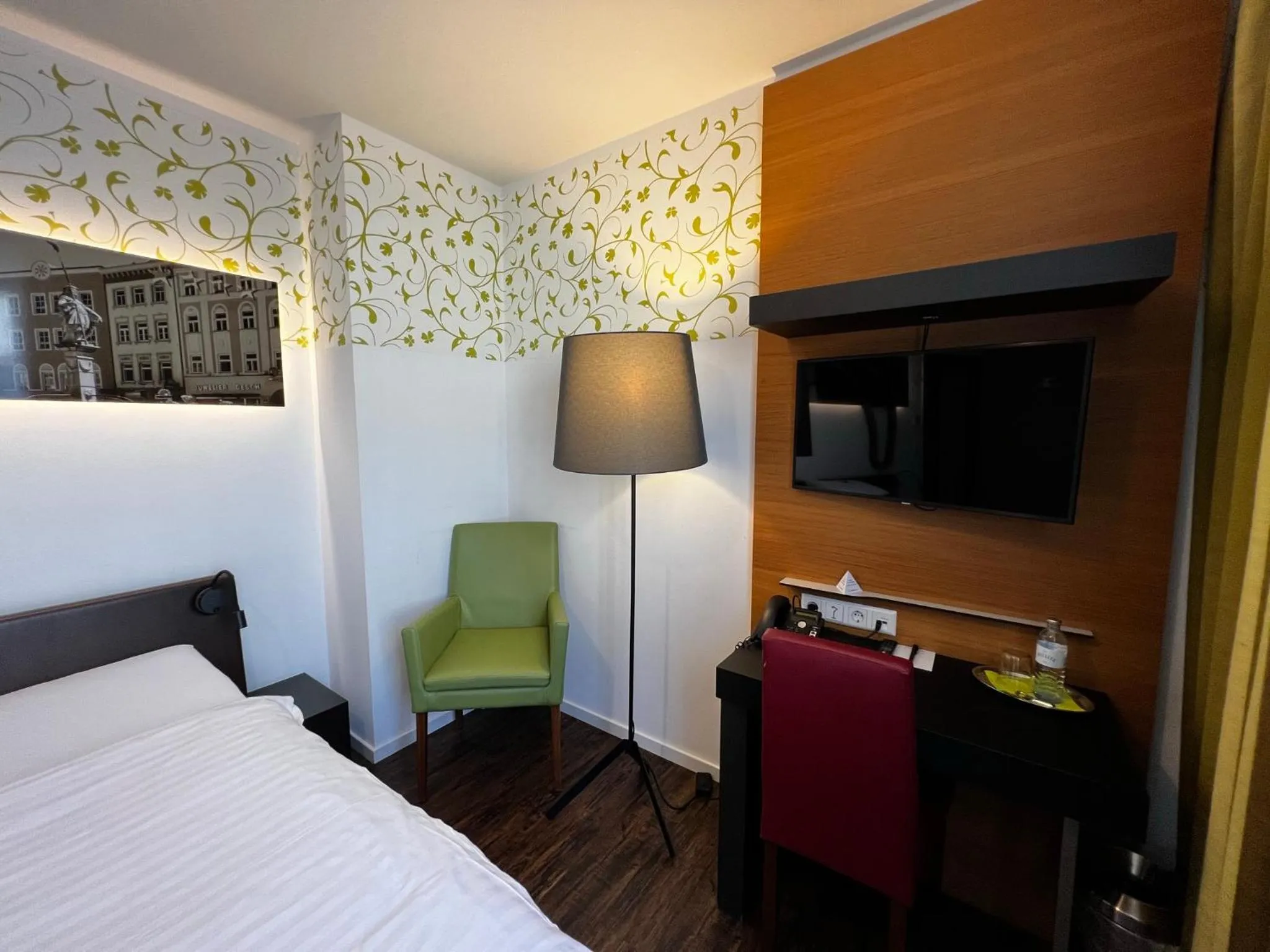 Photo of the whole room, Bed in H+ Hotel Ried