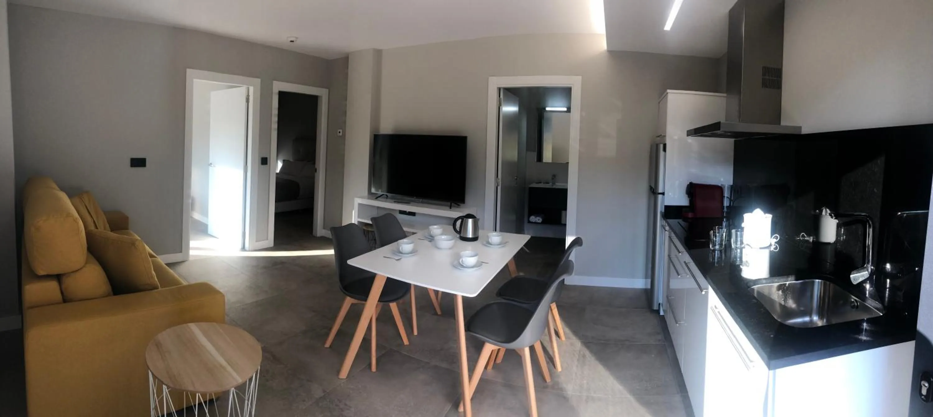 Kitchen or kitchenette in Aparthotel Ría de Lires