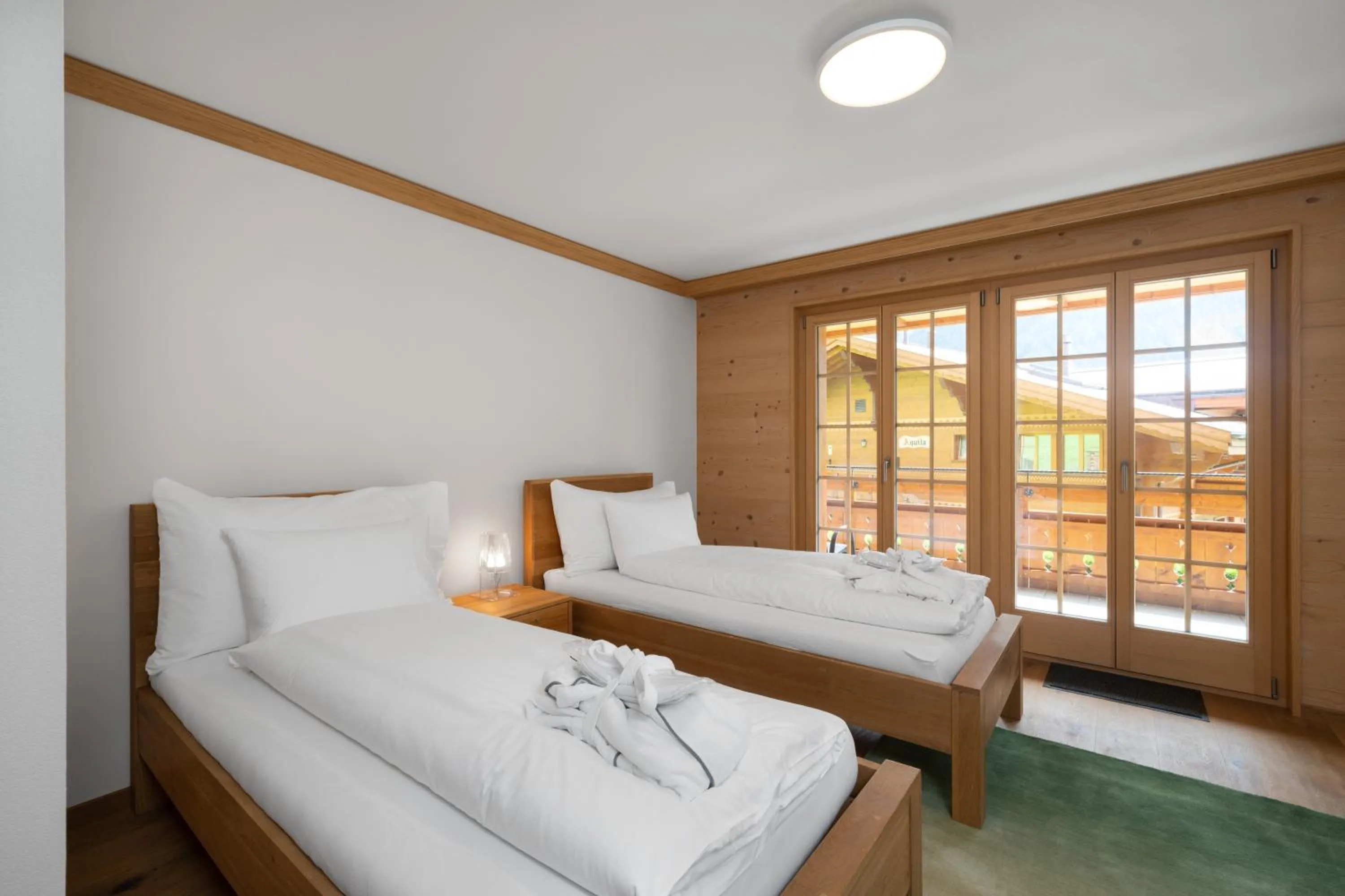 Bed in Chalet Alia and Apartments-Grindelwald by Swiss Hotel Apartments