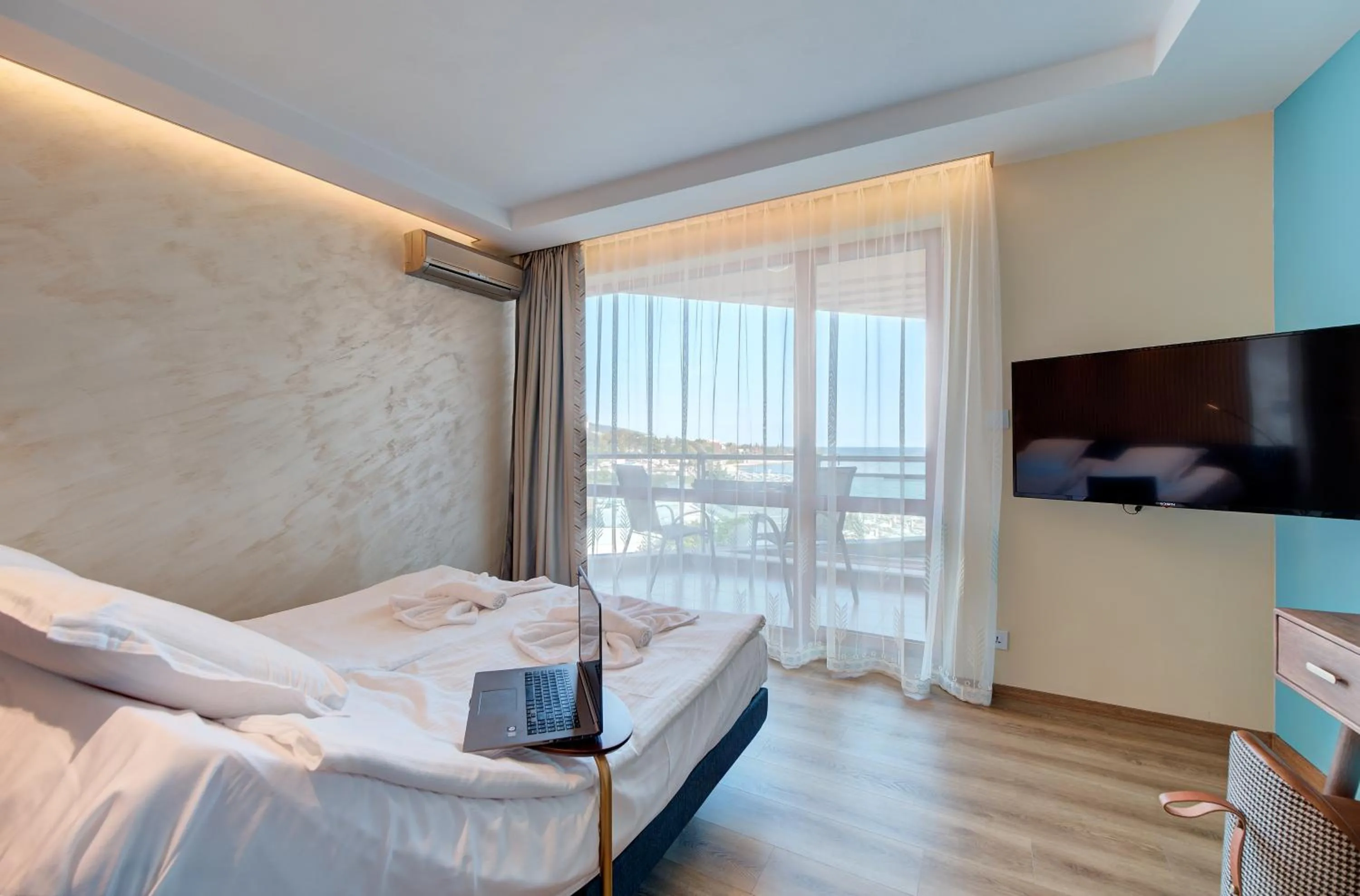 Bed in Beachfront Smart Homes by Marty's