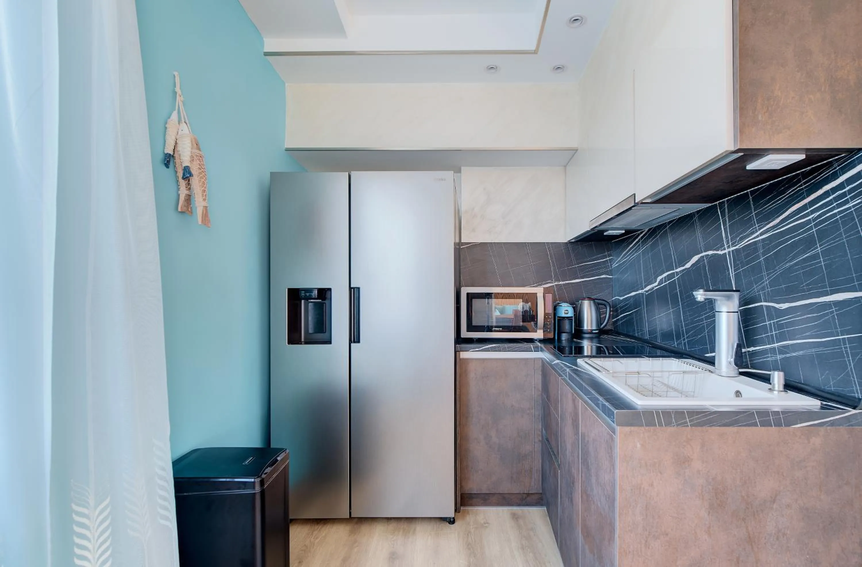 Kitchen or kitchenette in Beachfront Smart Homes by Marty's