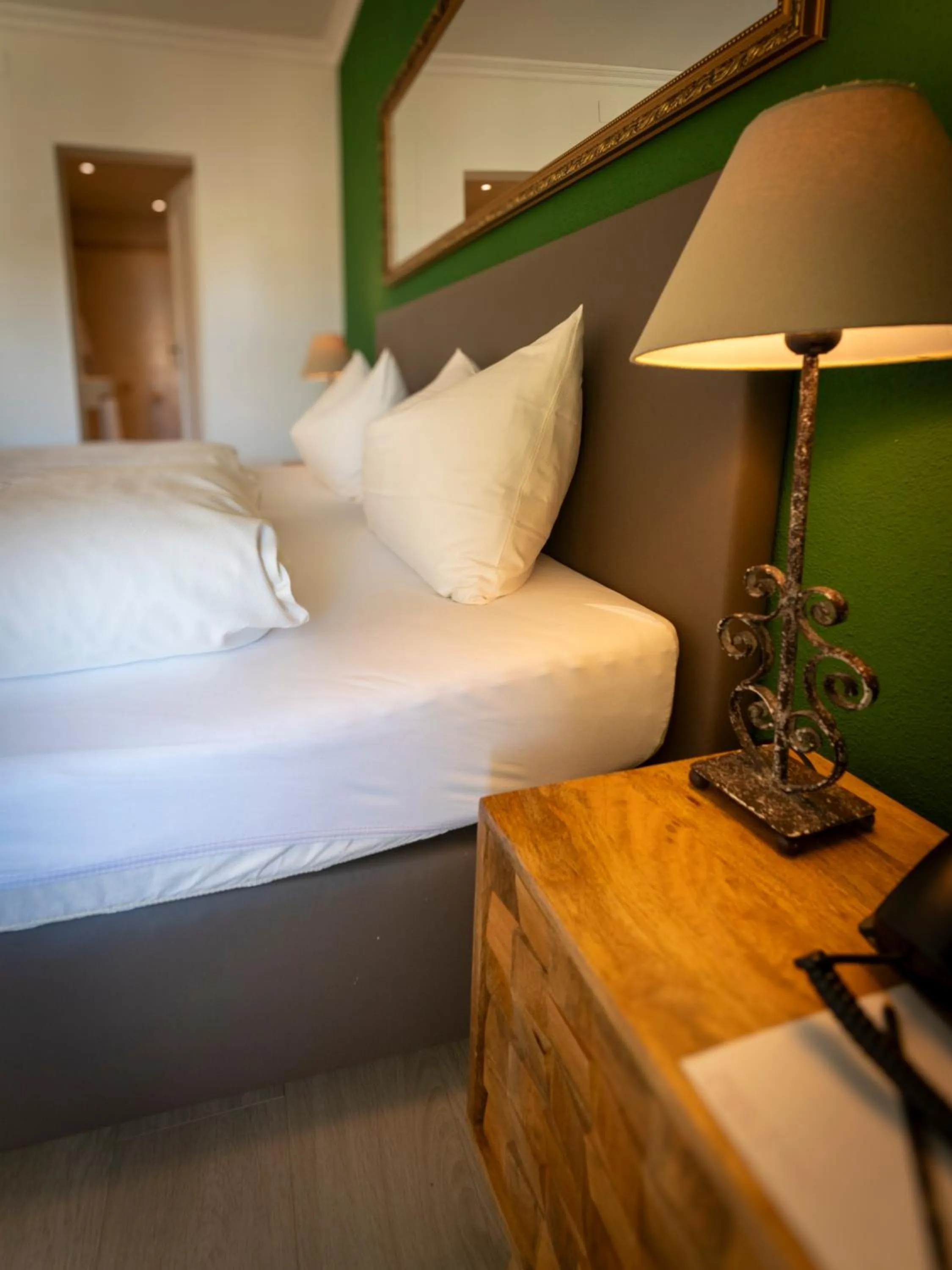 Bed in Hotel Europa Suites St Moritz