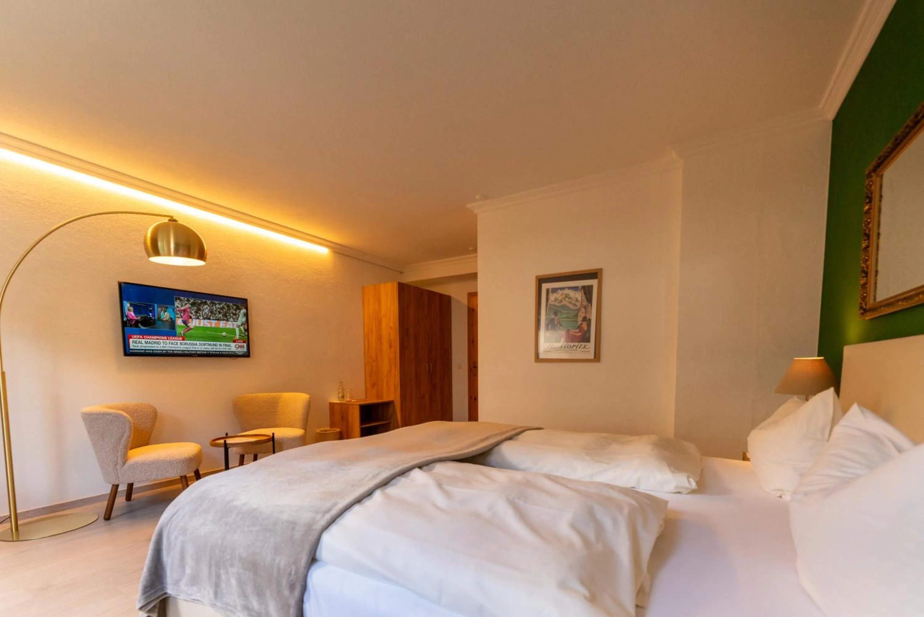 Bed in Hotel Europa Suites St Moritz