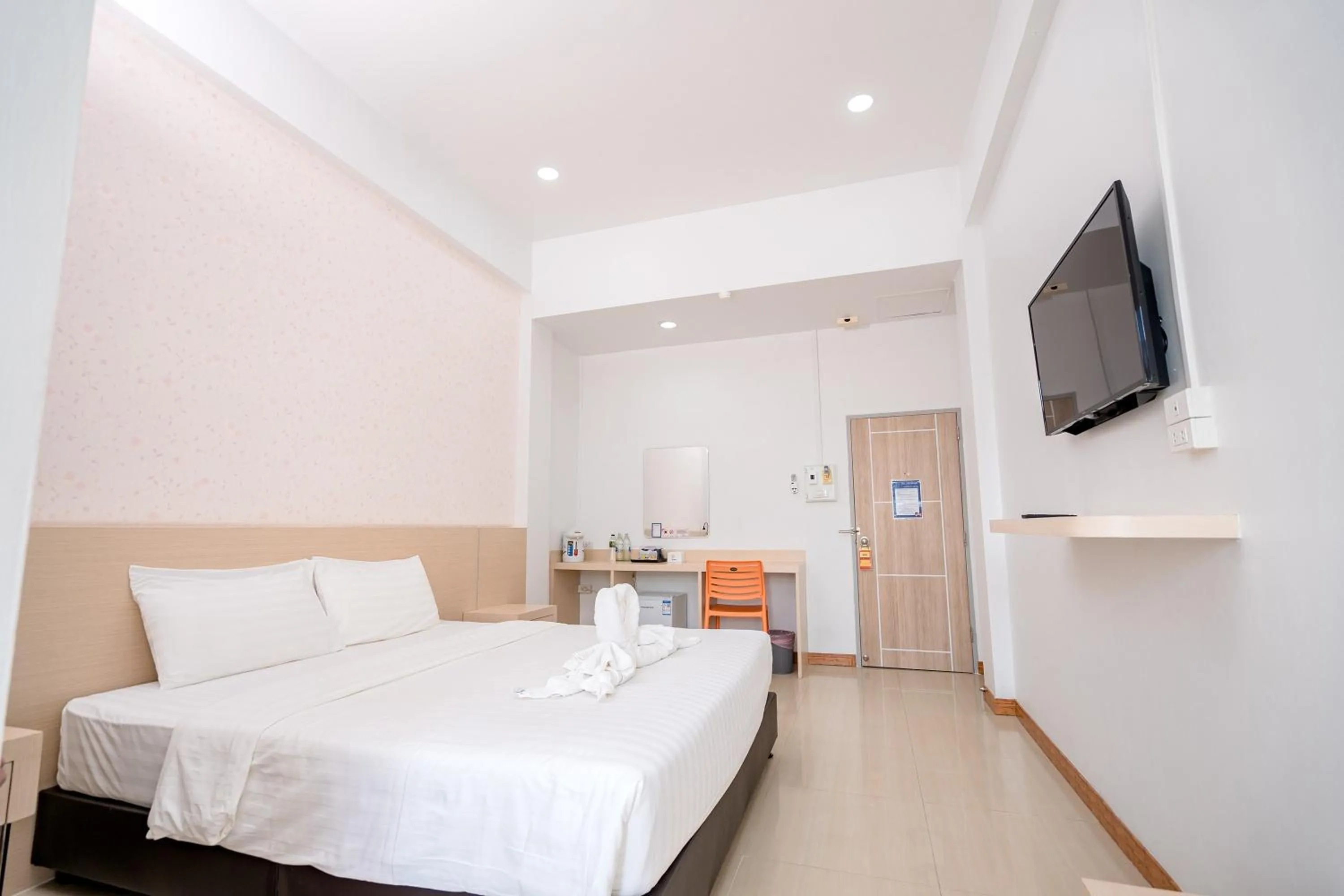 Bed in Top Inn Hotel