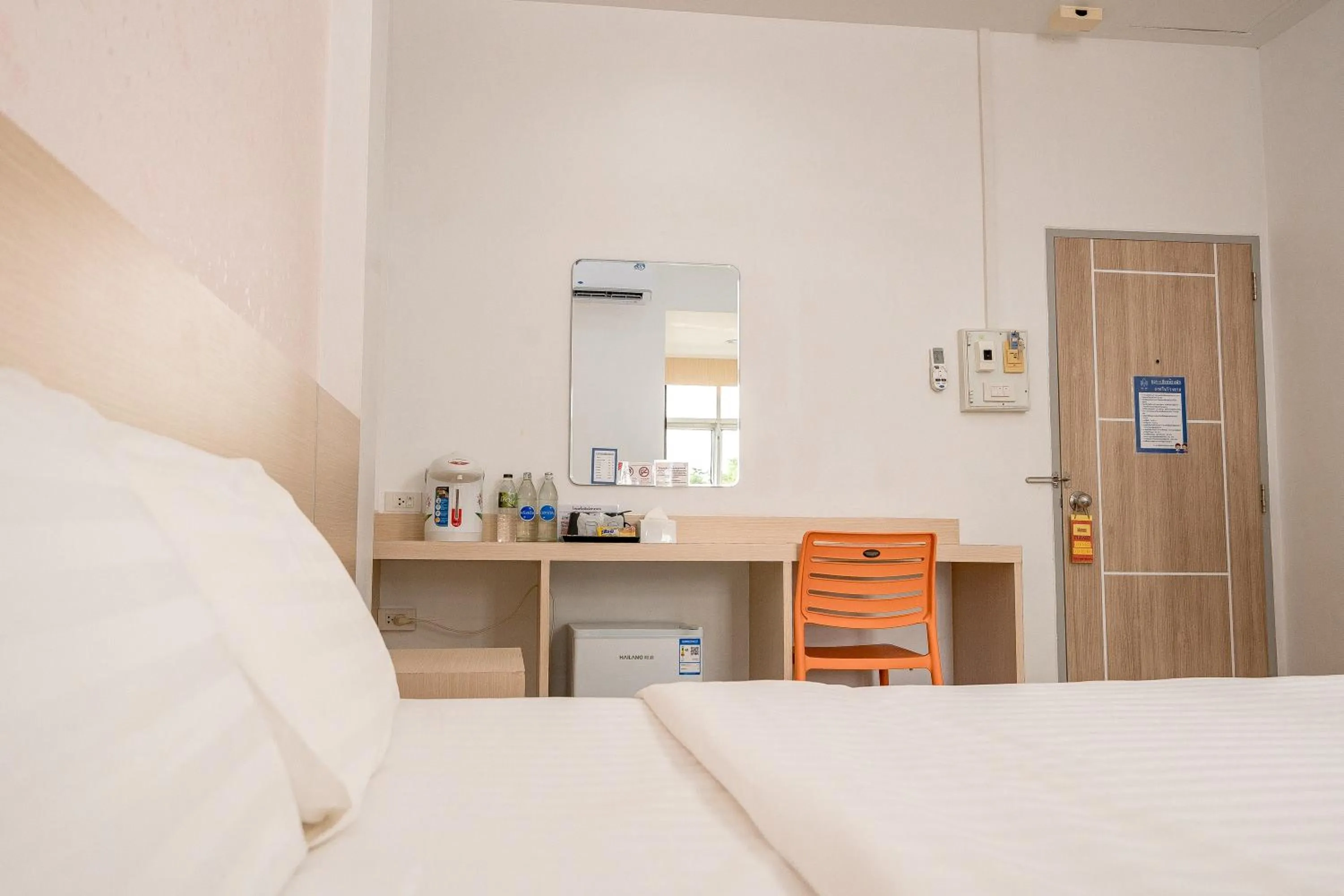 Bed in Top Inn Hotel