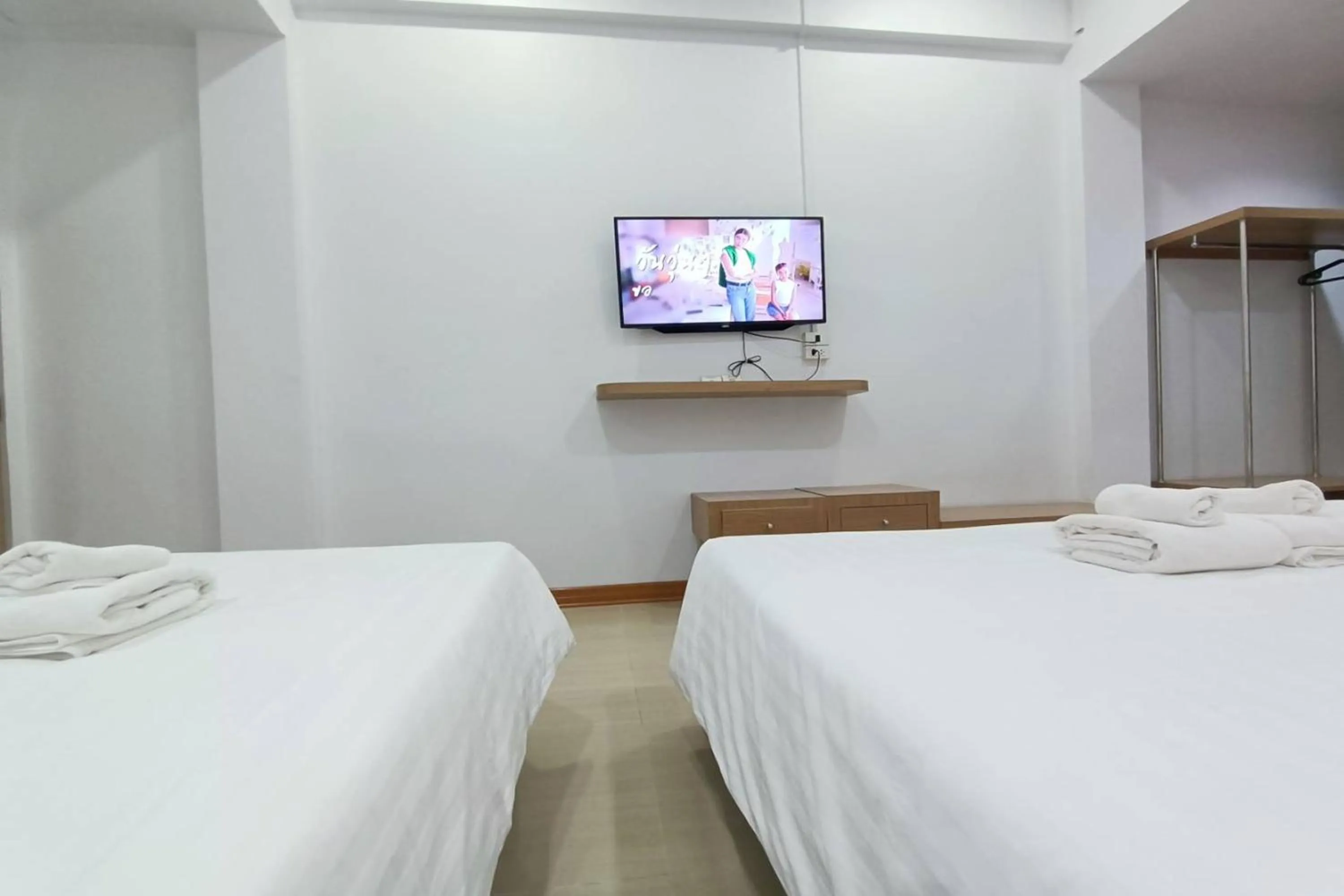 Bed in Top Inn Hotel