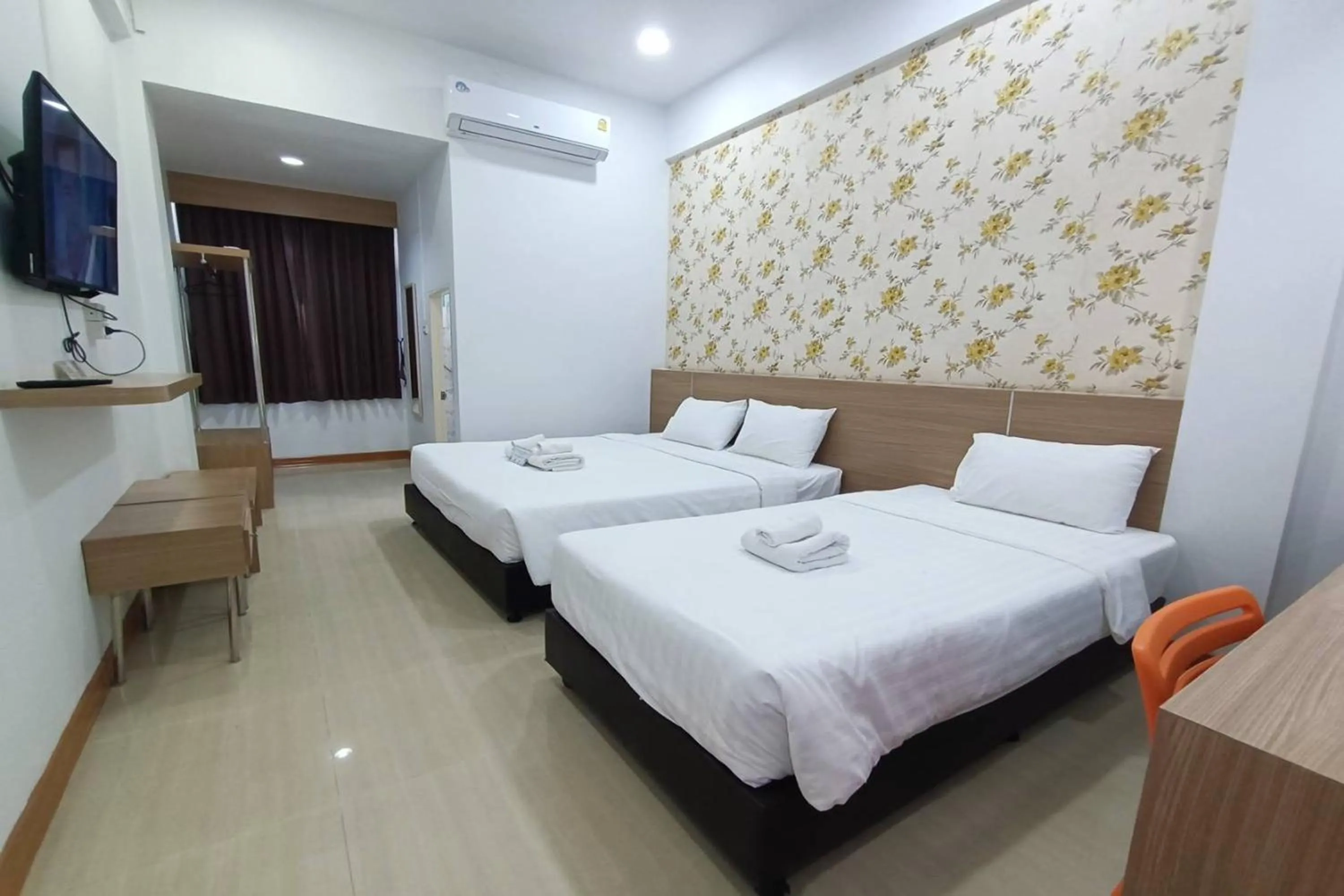 Bed in Top Inn Hotel