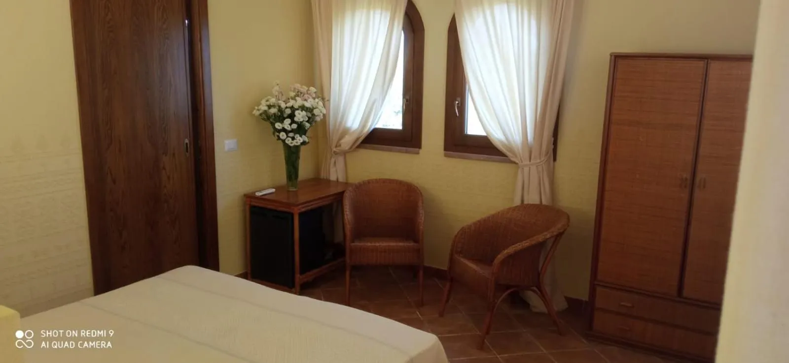 Photo of the whole room, Bed in S'ena Hotel