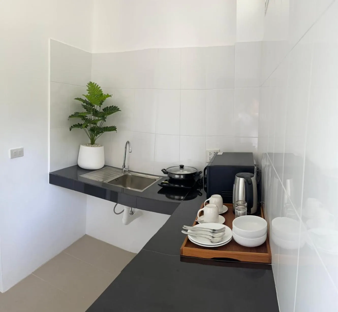 Kitchen or kitchenette in Pure Laguna Residence by Nice Sea Resort