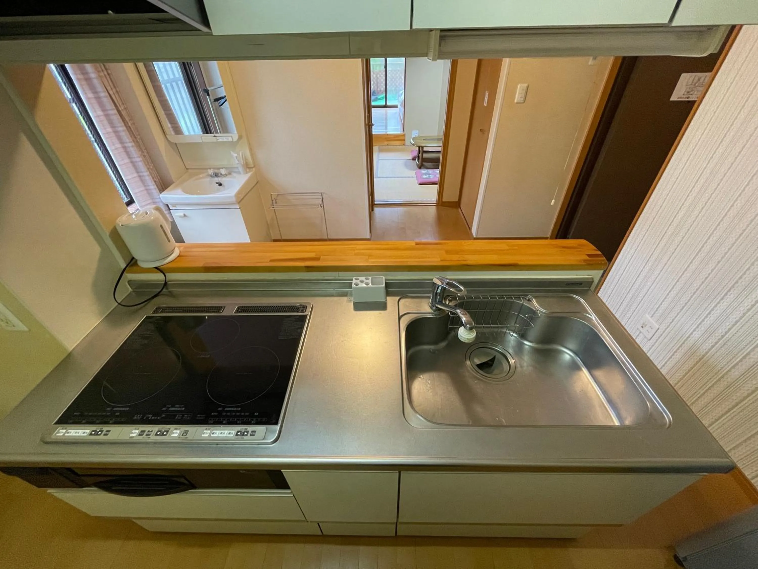 Kitchen or kitchenette in Hotel Isodokei