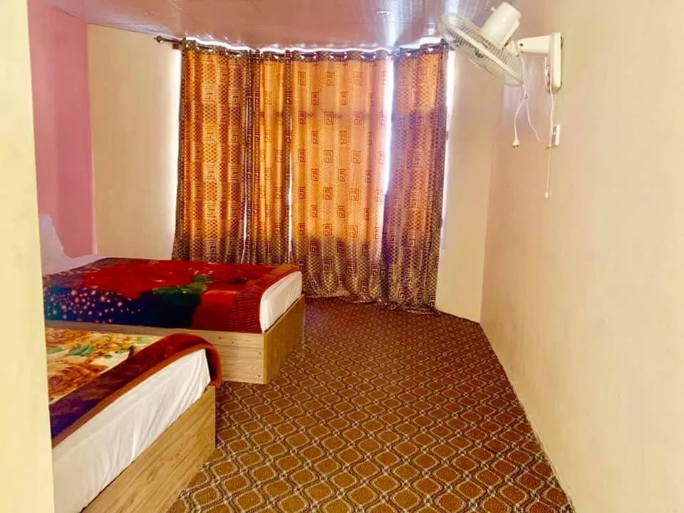 Bed in Hunza Panorama Hotel