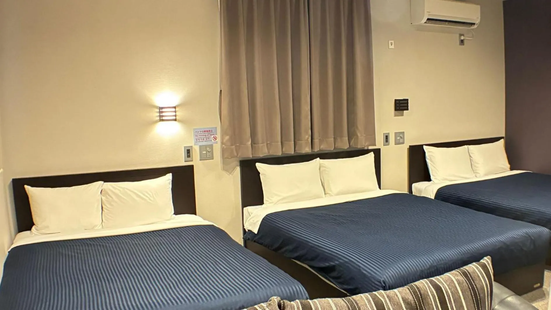 Photo of the whole room, Bed in GRAND BASE Hakataminami