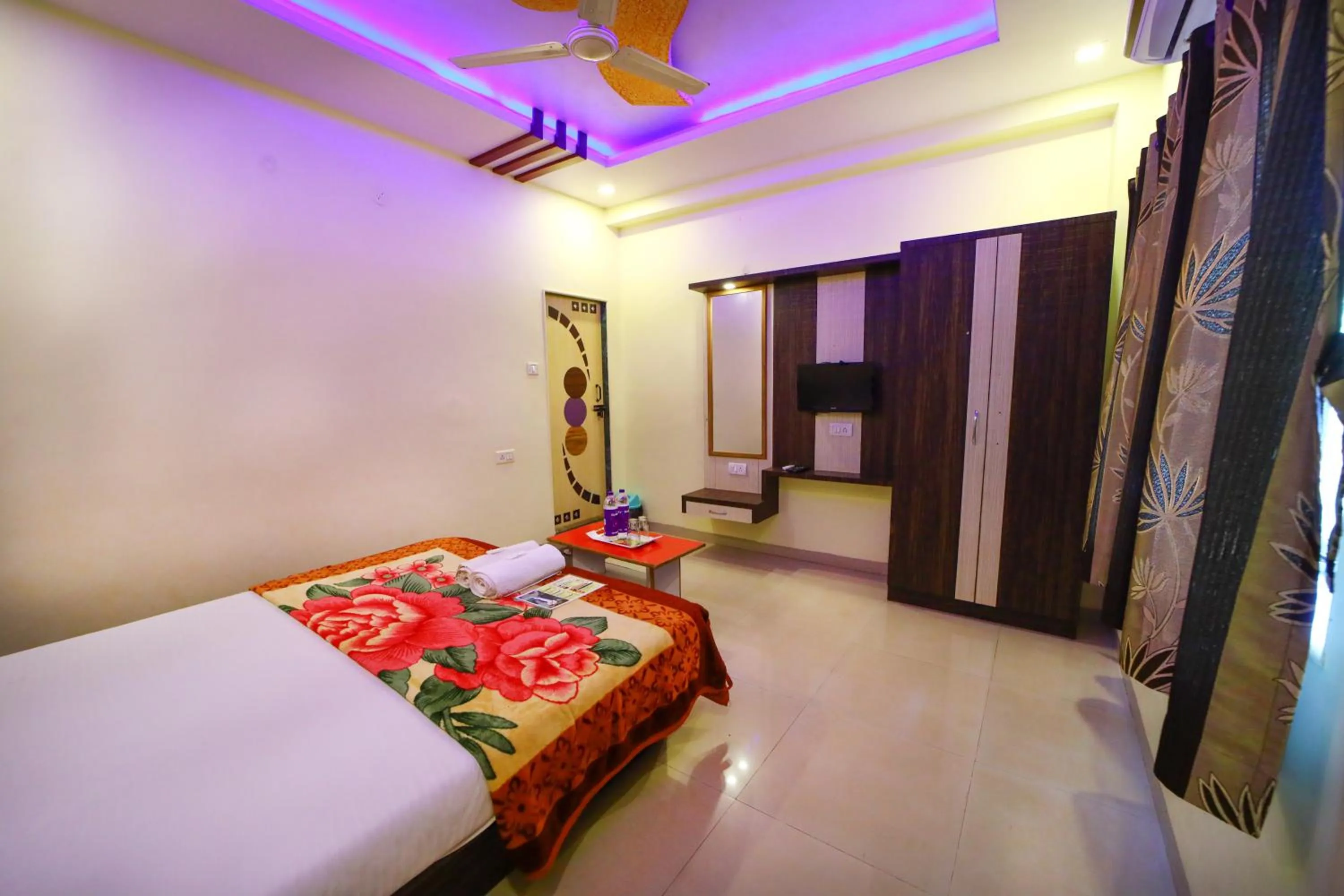 Bed in Hotel Green Exotica Mahabaleshwar