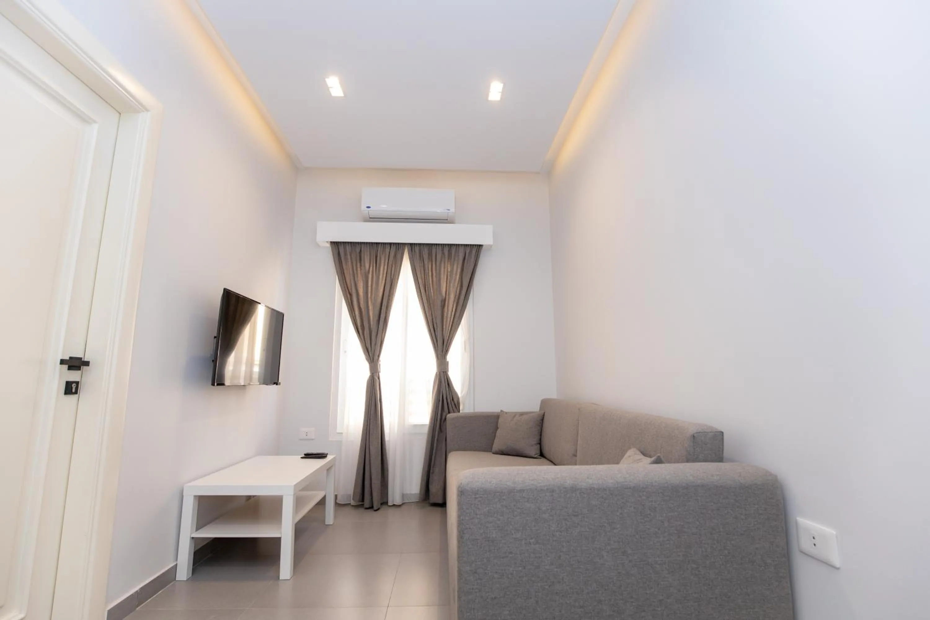 Communal lounge/ TV room in Villa 55