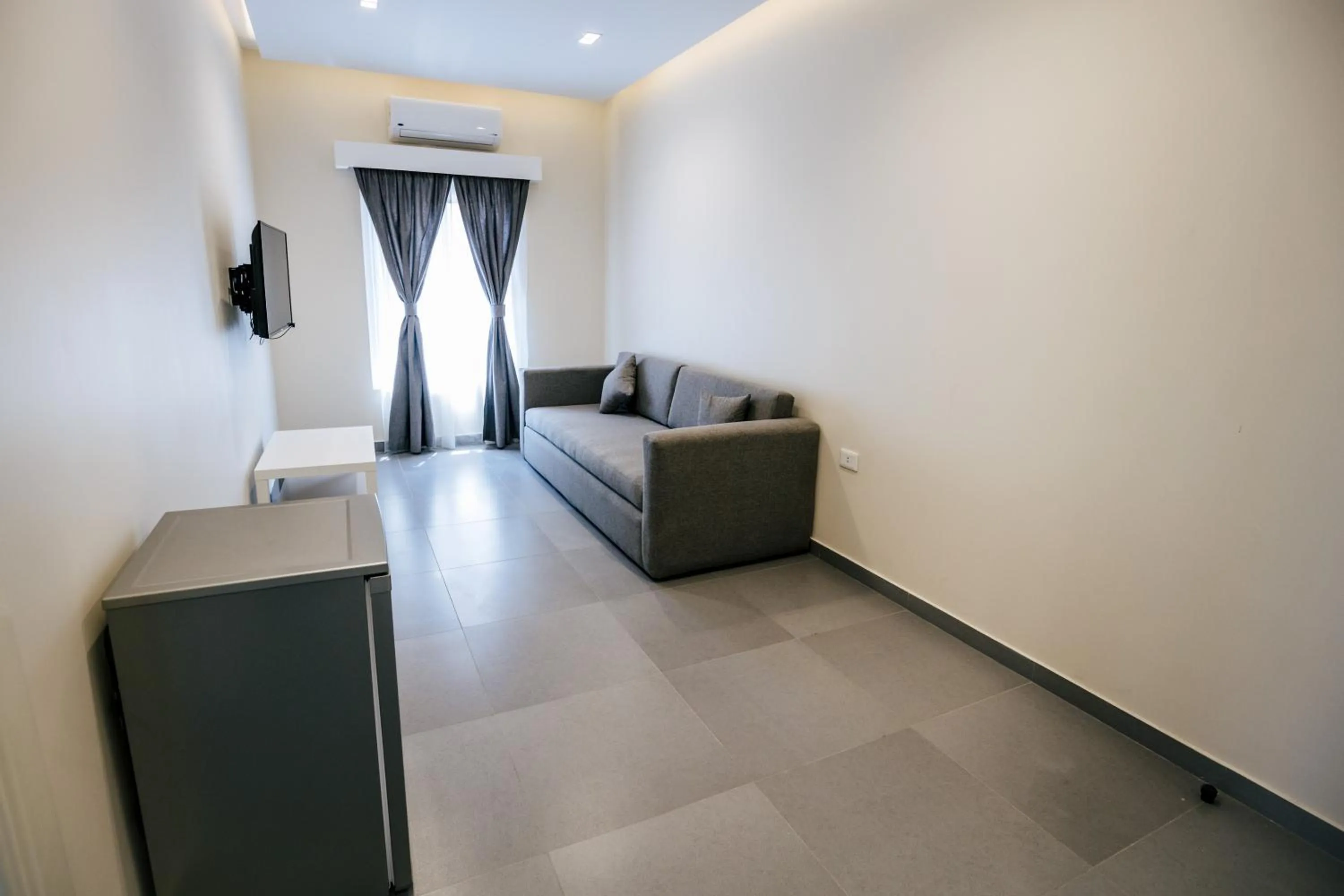 Communal lounge/ TV room in Villa 55