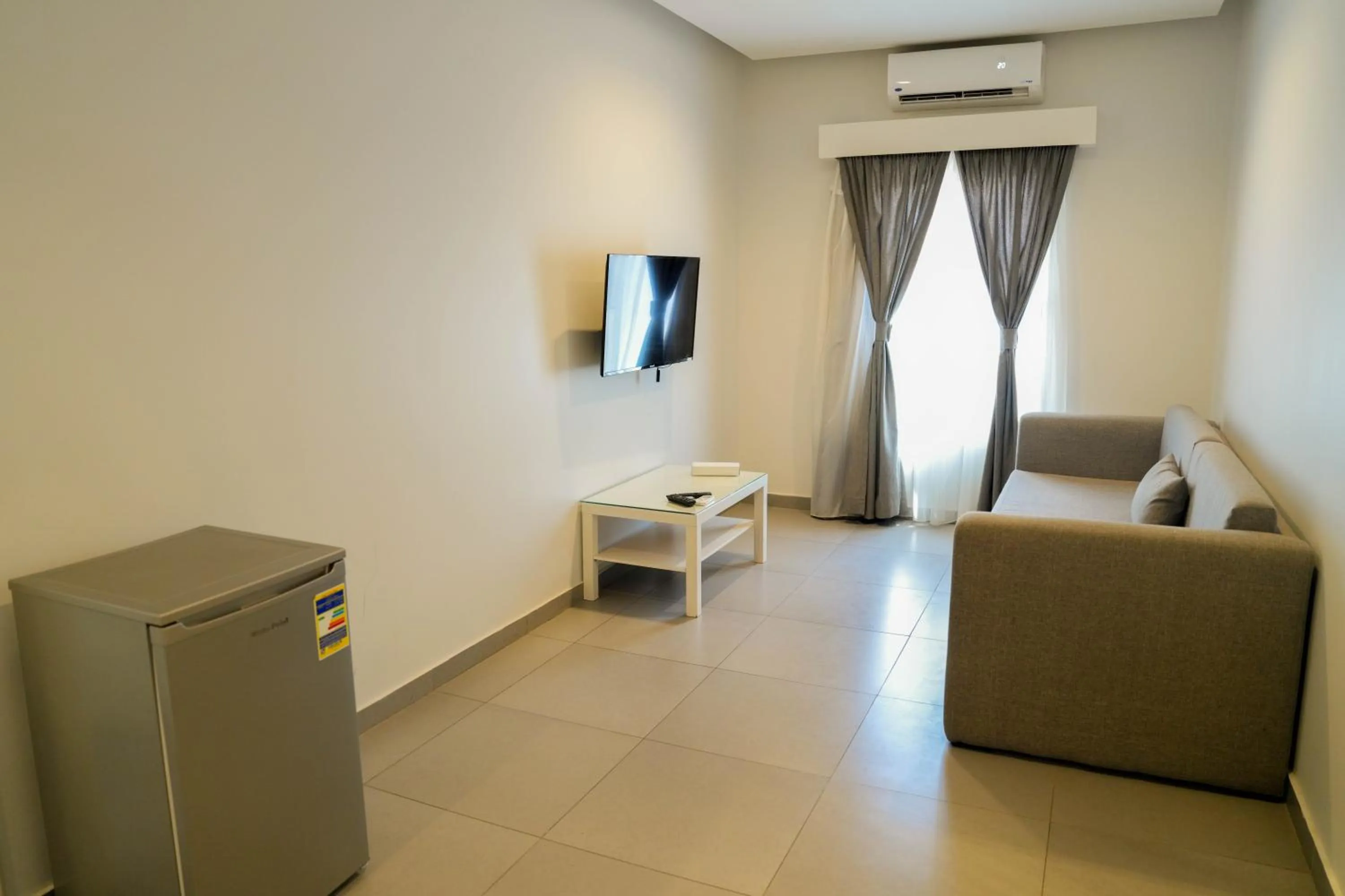 Communal lounge/ TV room in Villa 55