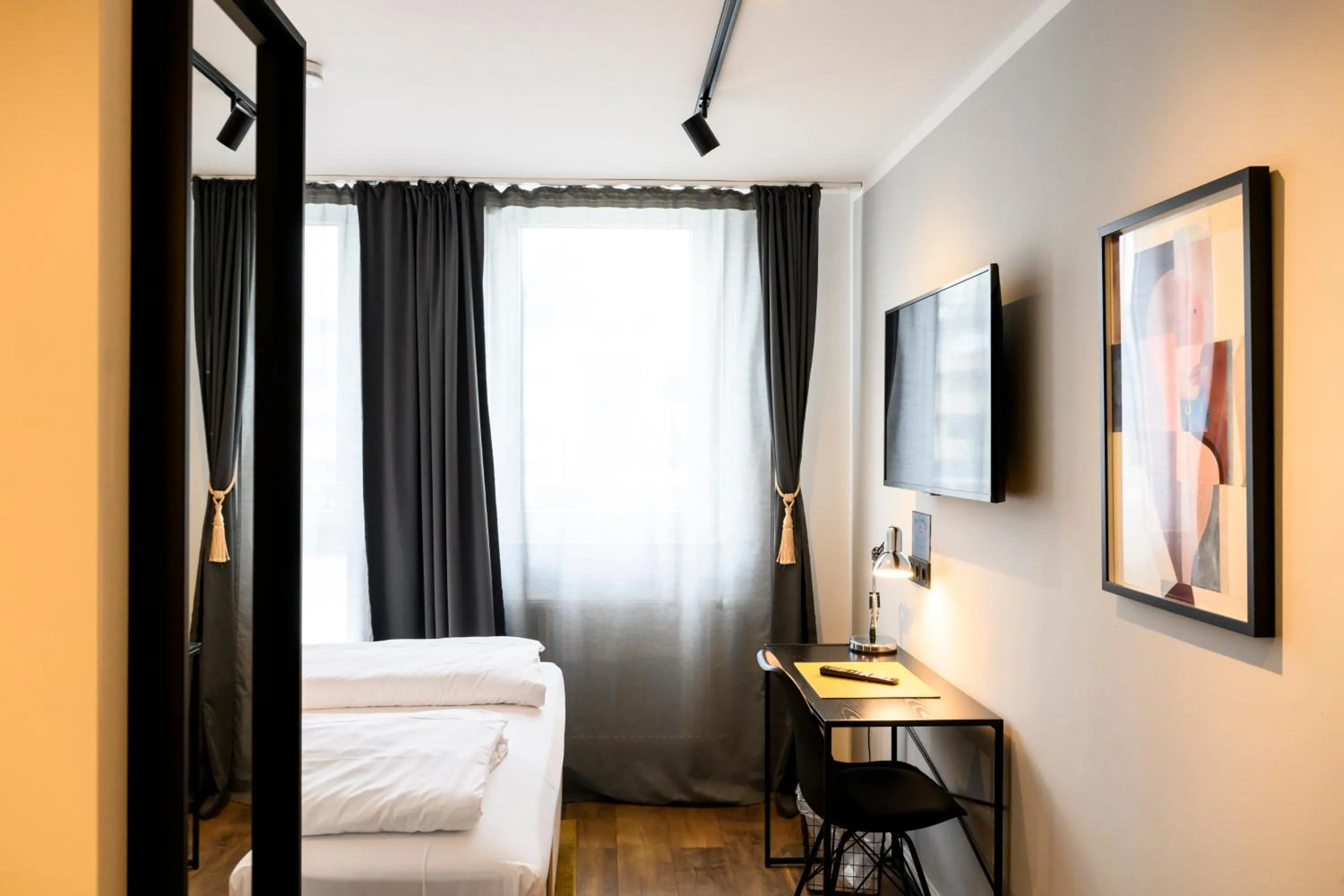 Bed in Nikii City Hotel