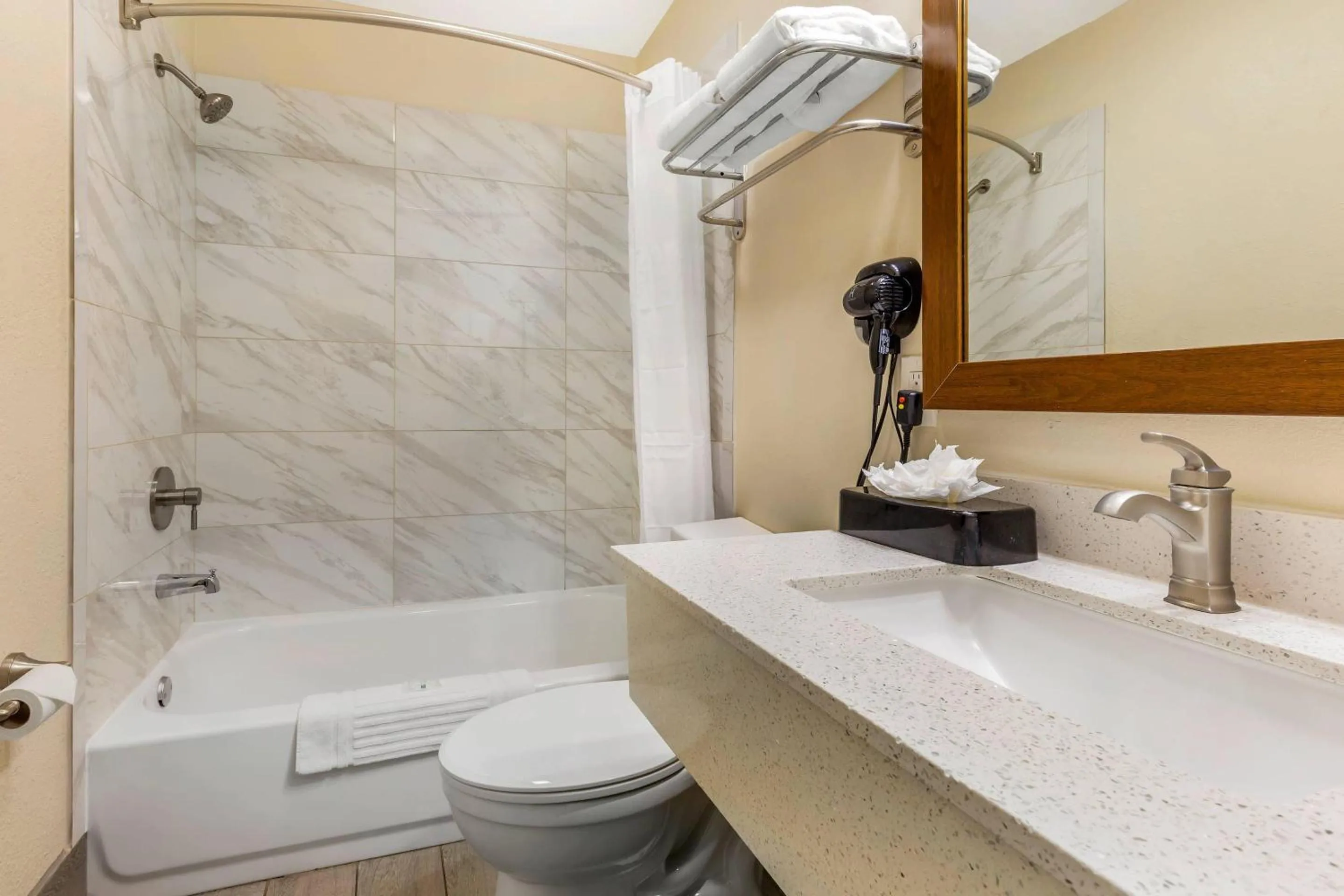 Bedroom in Quality Inn & Suites Spring Lake - Fayetteville near Fort Bragg