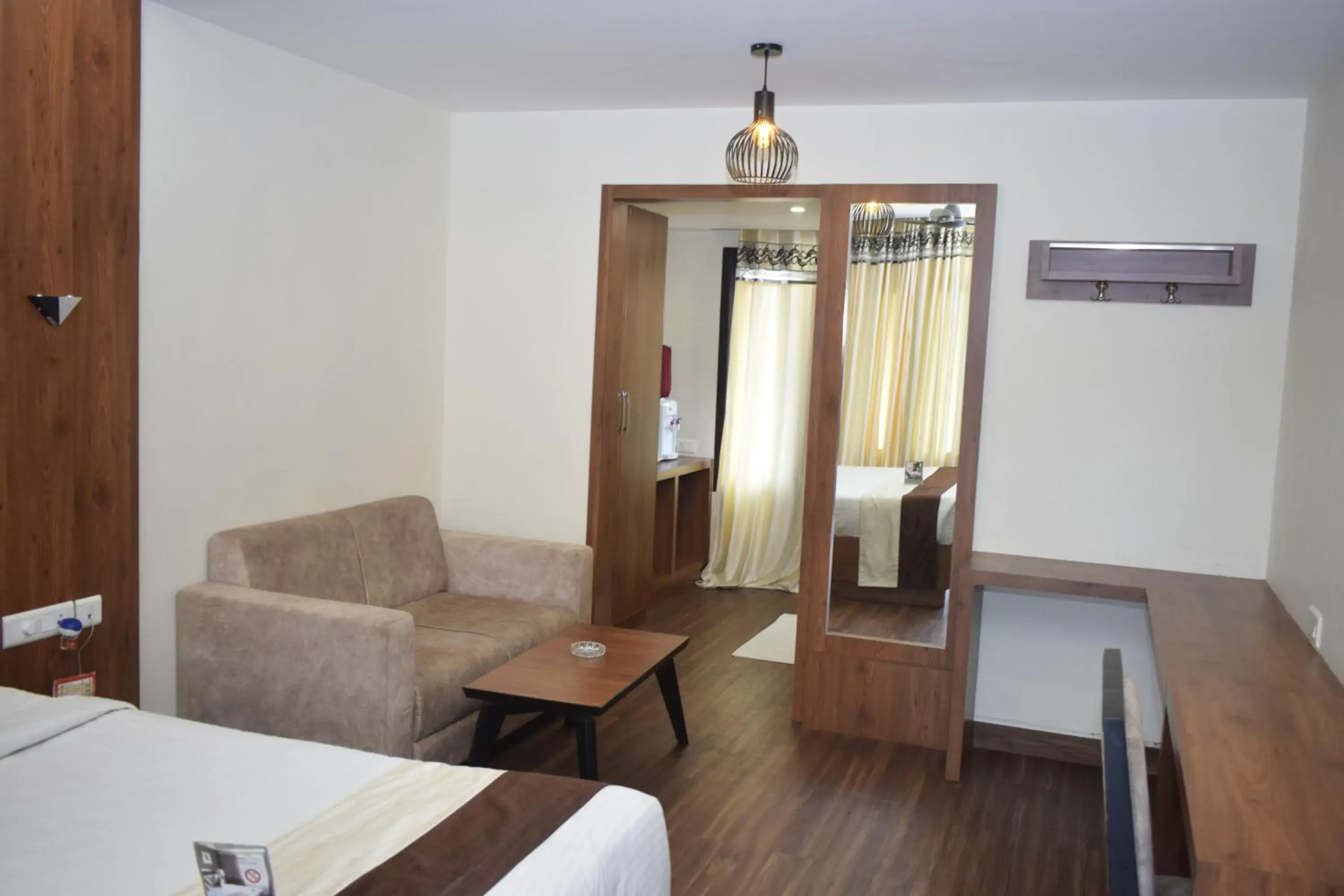 Living room, Bed in Hotel Apple Valley Living room, Bed in Hotel Apple Valley