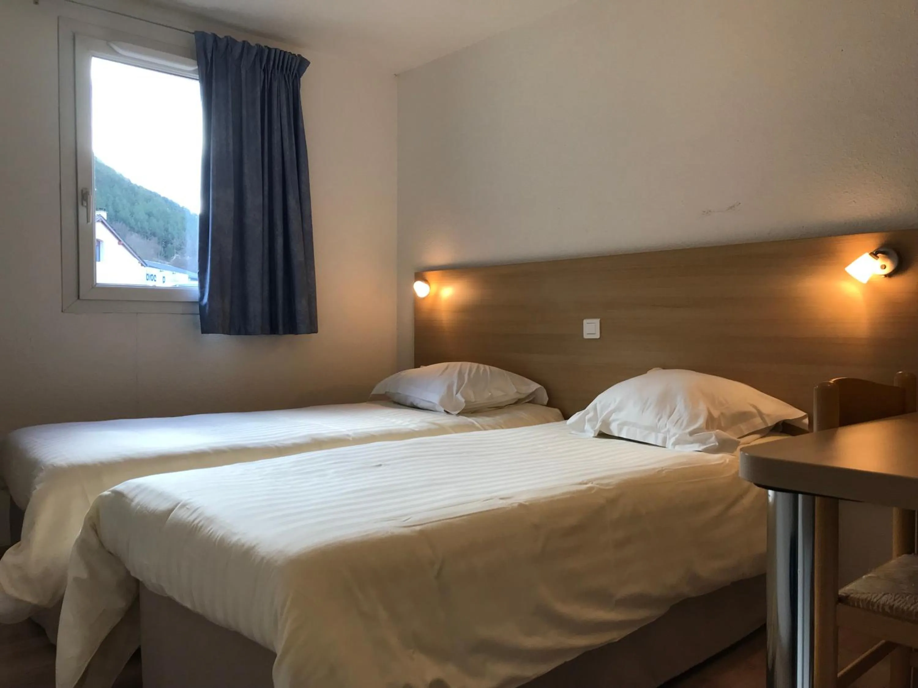 Photo of the whole room, Bed in Brit Hotel Essentiel Deltour Mende