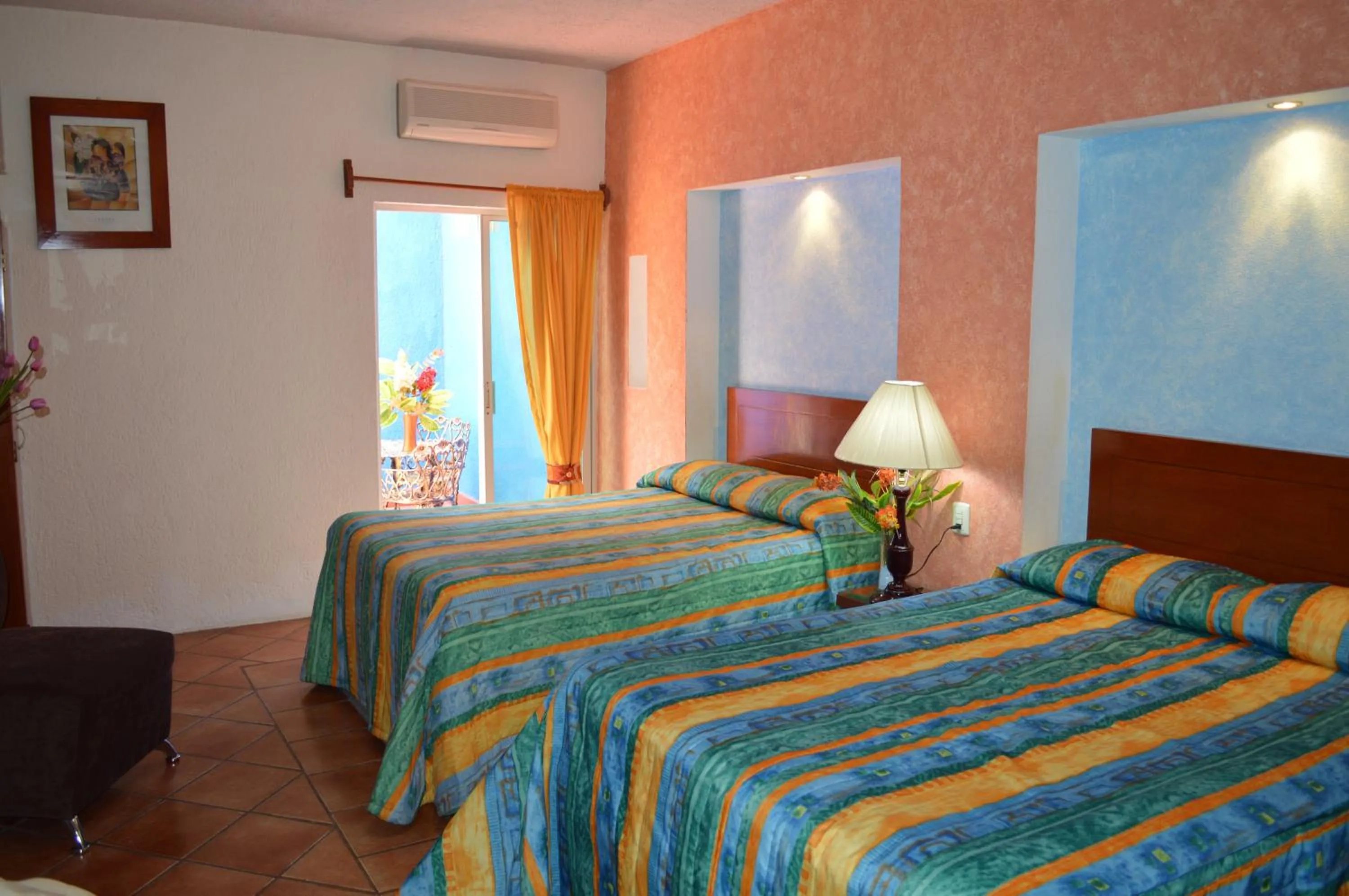 Bed in Hotel La Rienda Mision Tequillan